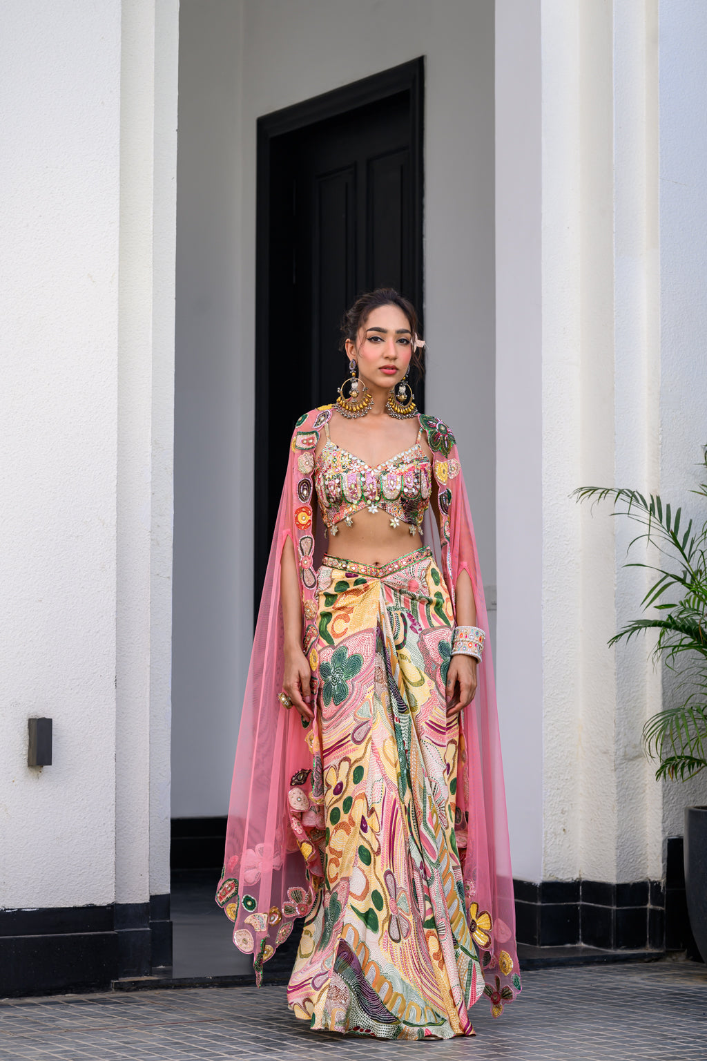 FLORA HIGHLIGHT BRALETTE PAIRED WITH DHOTI AKIRT AND APL CAPE SET
