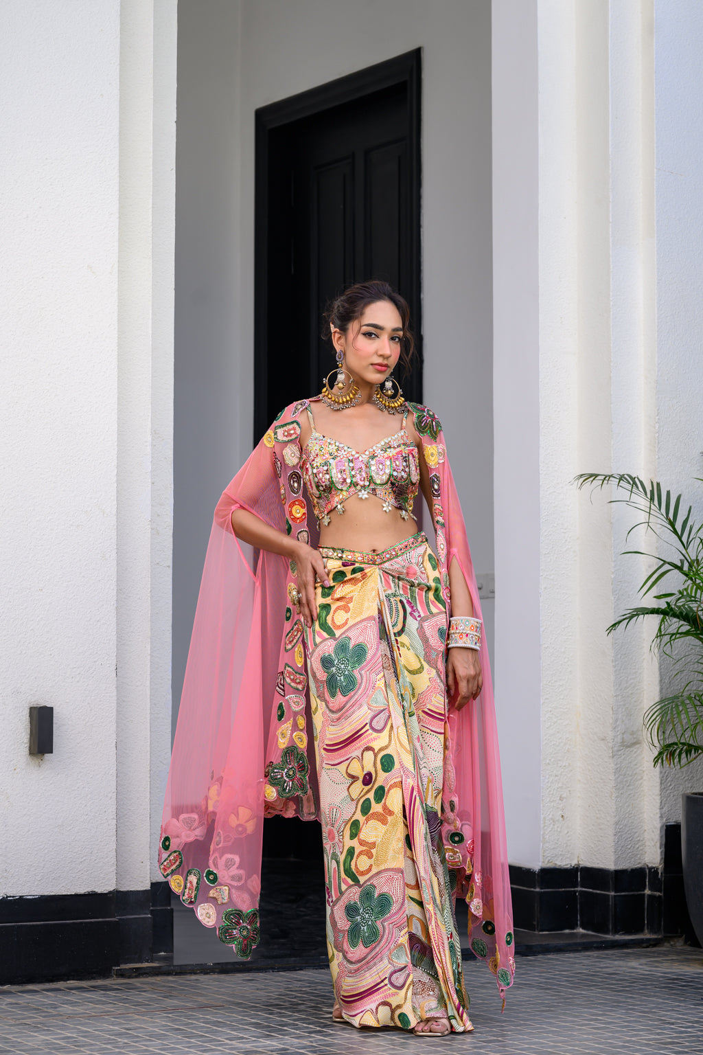 FLORA HIGHLIGHT BRALETTE PAIRED WITH DHOTI AKIRT AND APL CAPE SET