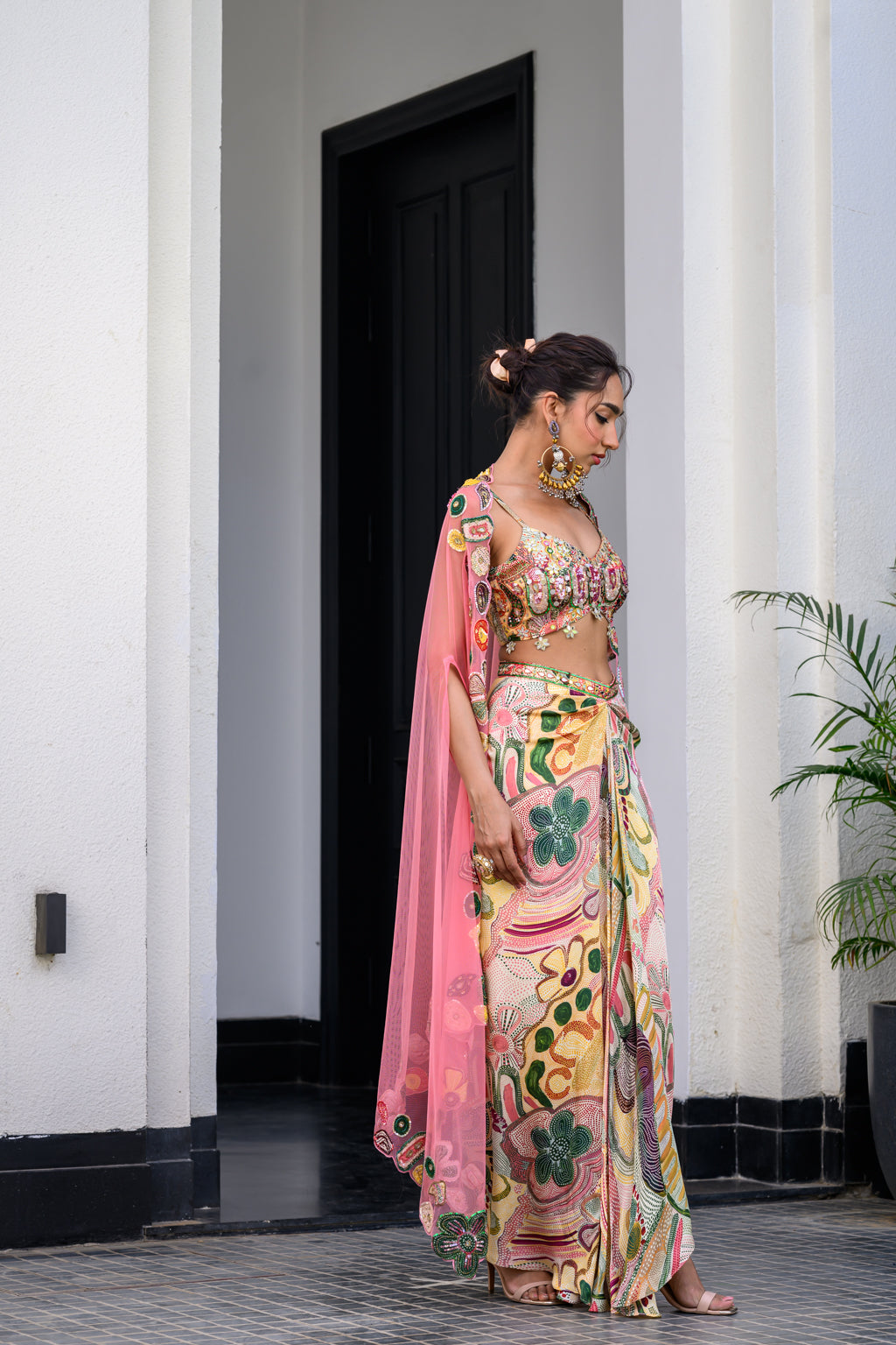 FLORA HIGHLIGHT BRALETTE PAIRED WITH DHOTI AKIRT AND APL CAPE SET