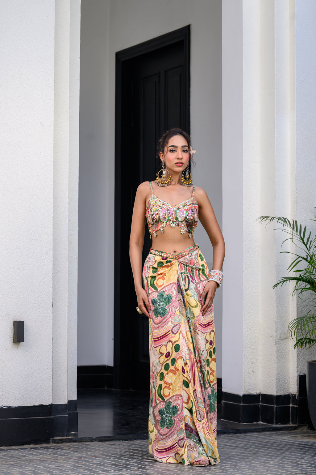 FLORA HIGHLIGHT BRALETTE PAIRED WITH DHOTI AKIRT AND APL CAPE SET