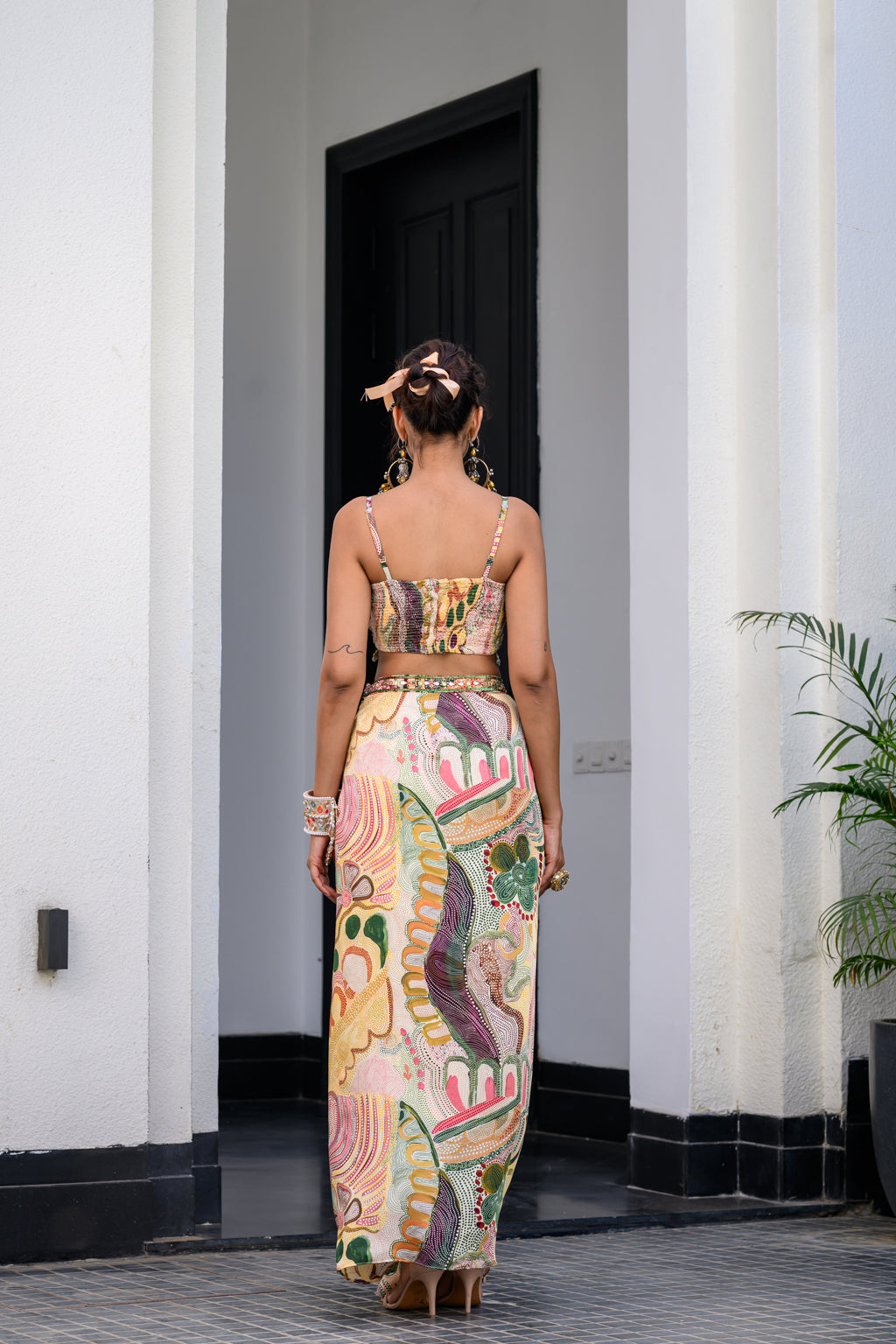 FLORA HIGHLIGHT BRALETTE PAIRED WITH DHOTI AKIRT AND APL CAPE SET