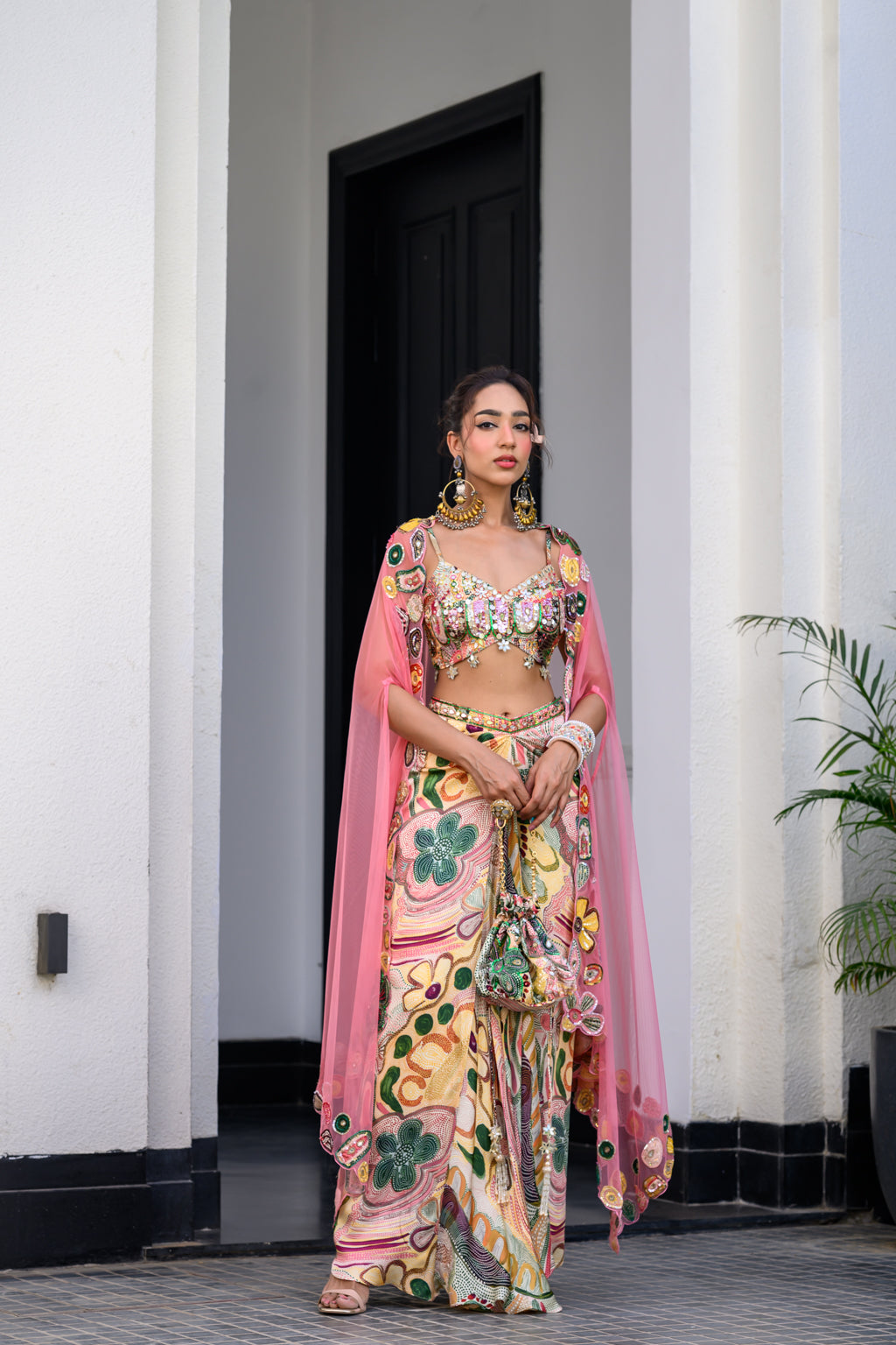 FLORA HIGHLIGHT BRALETTE PAIRED WITH DHOTI AKIRT AND APL CAPE SET