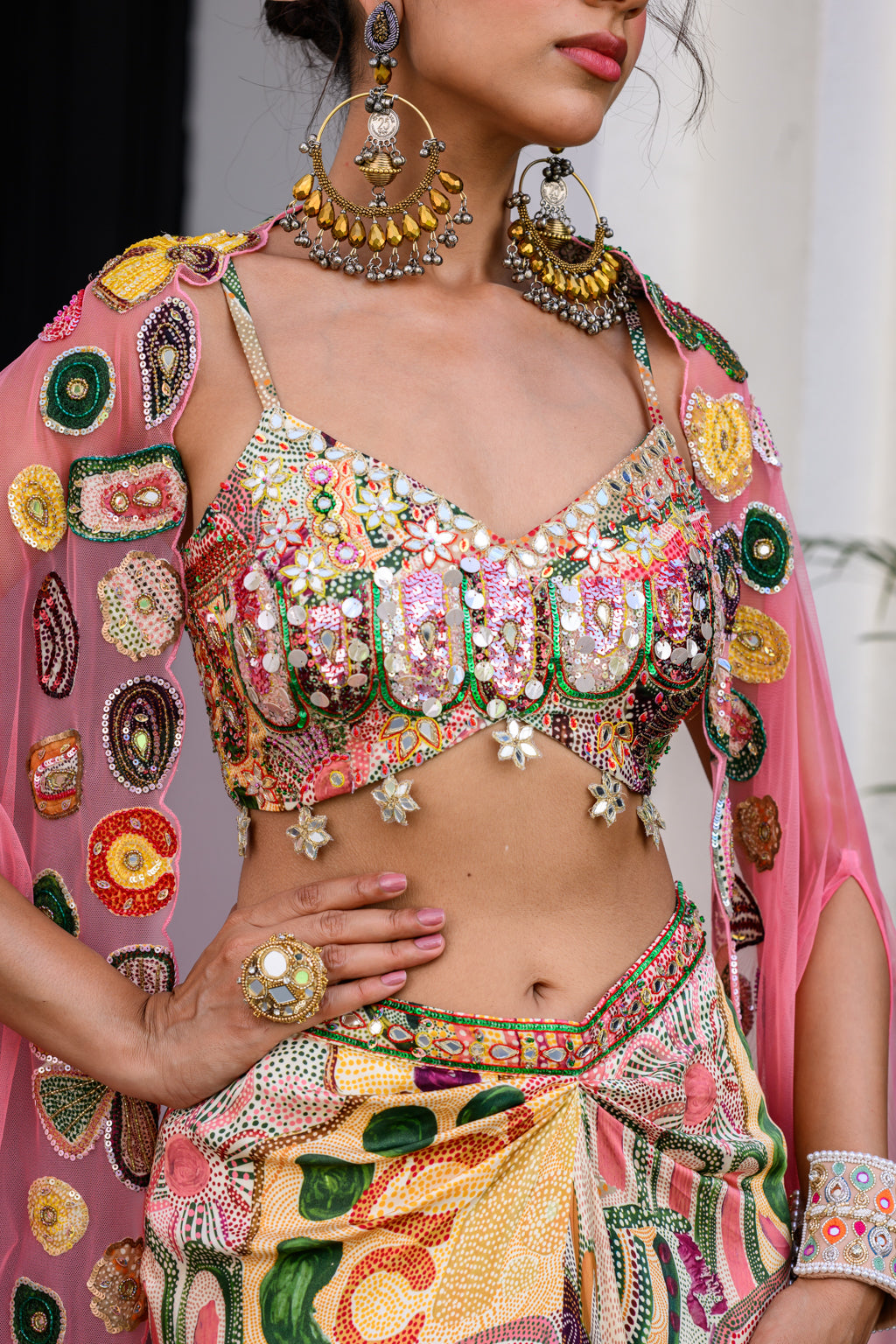 FLORA HIGHLIGHT BRALETTE PAIRED WITH DHOTI AKIRT AND APL CAPE SET