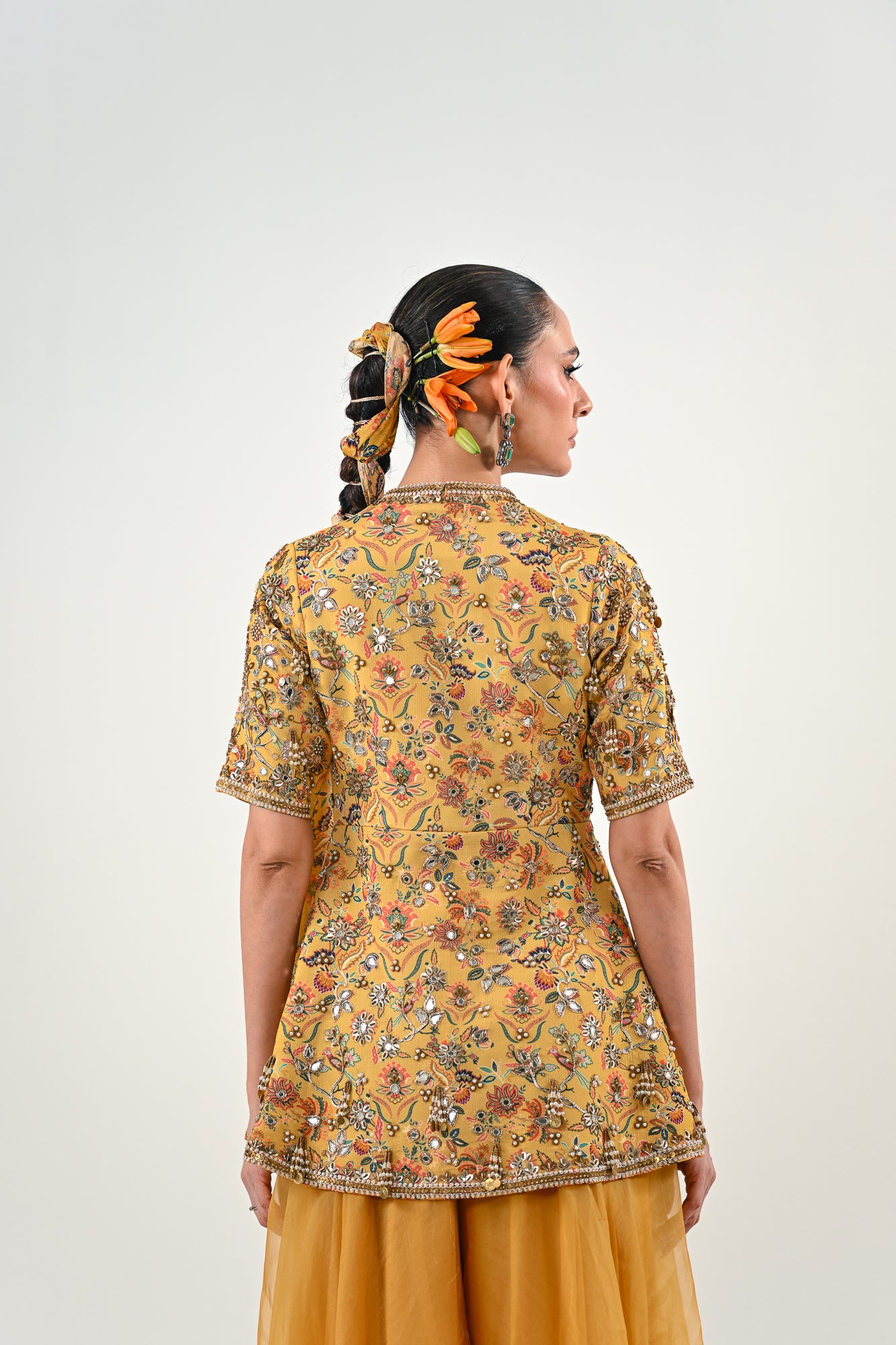 M FLARED PANT EMBROIDERED PEPLUM TOP