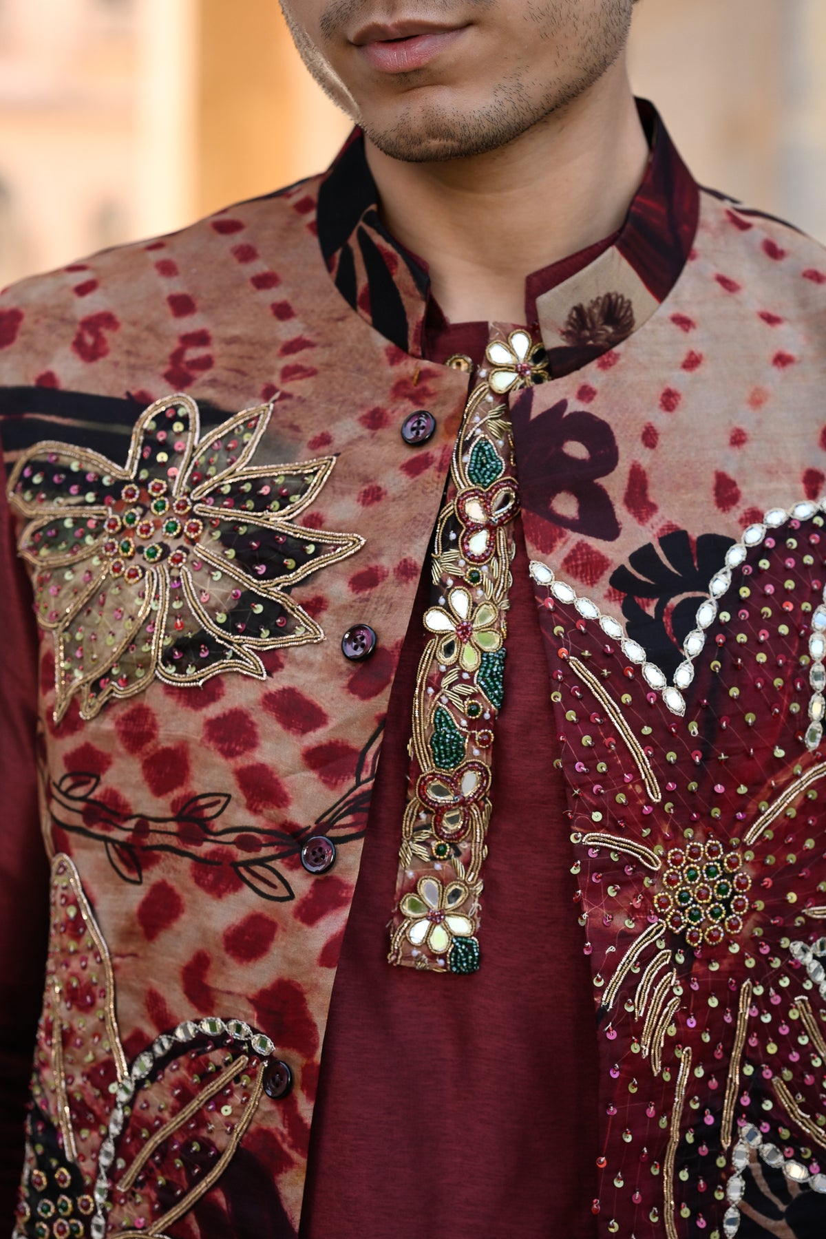 ORGANZA HIGHLIGHTED BUNDI WITH PLAIN MAROON KURTA WITH PURTIN & CUFF EMB BORDER AND FLAIR MAROON PANT