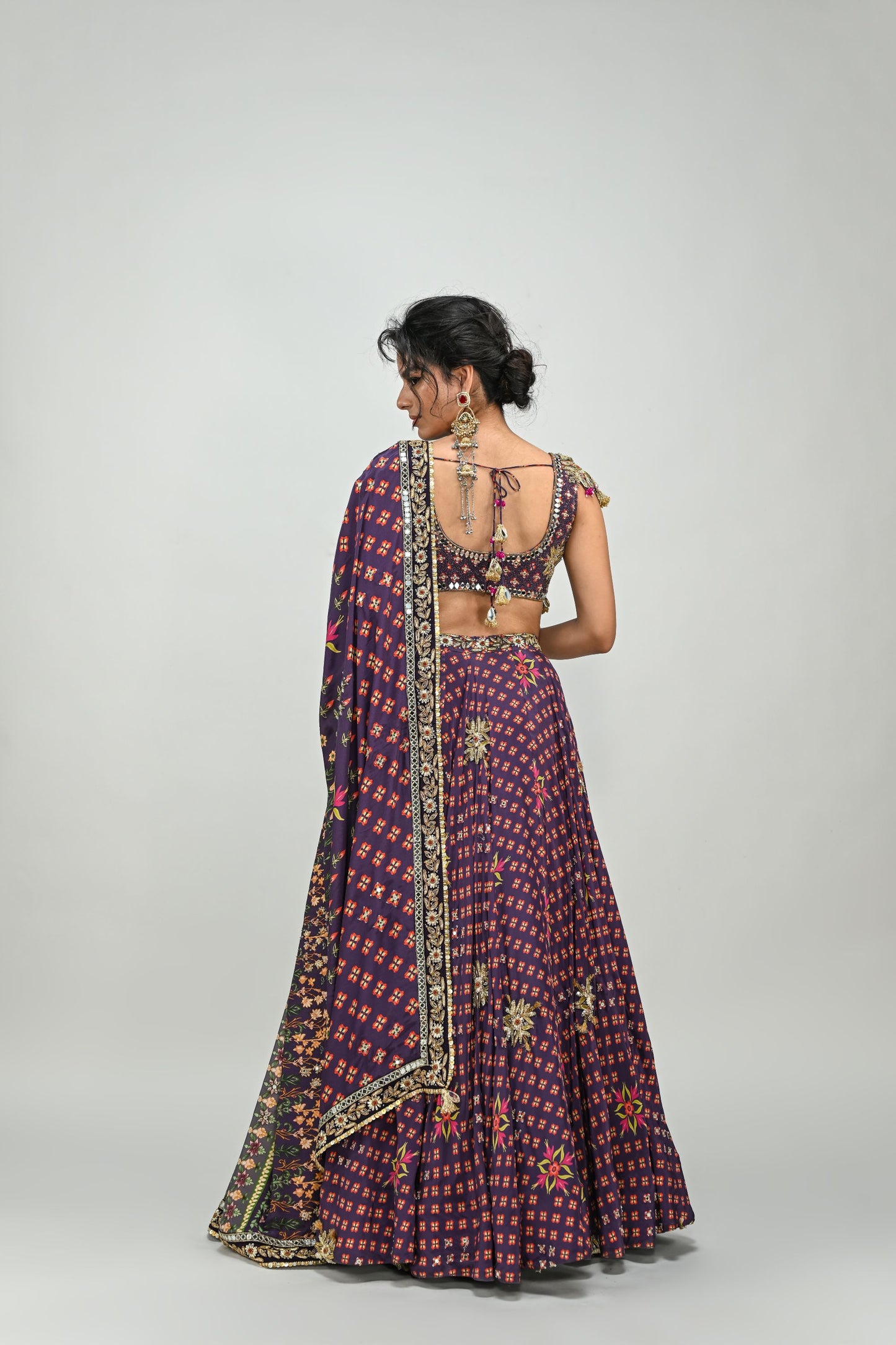PLUM HIGHLIGHTED LEHENGA PAIRED WITH PLUM BADLA BLOUSE AND HIGHLIGHTED DUPATTA