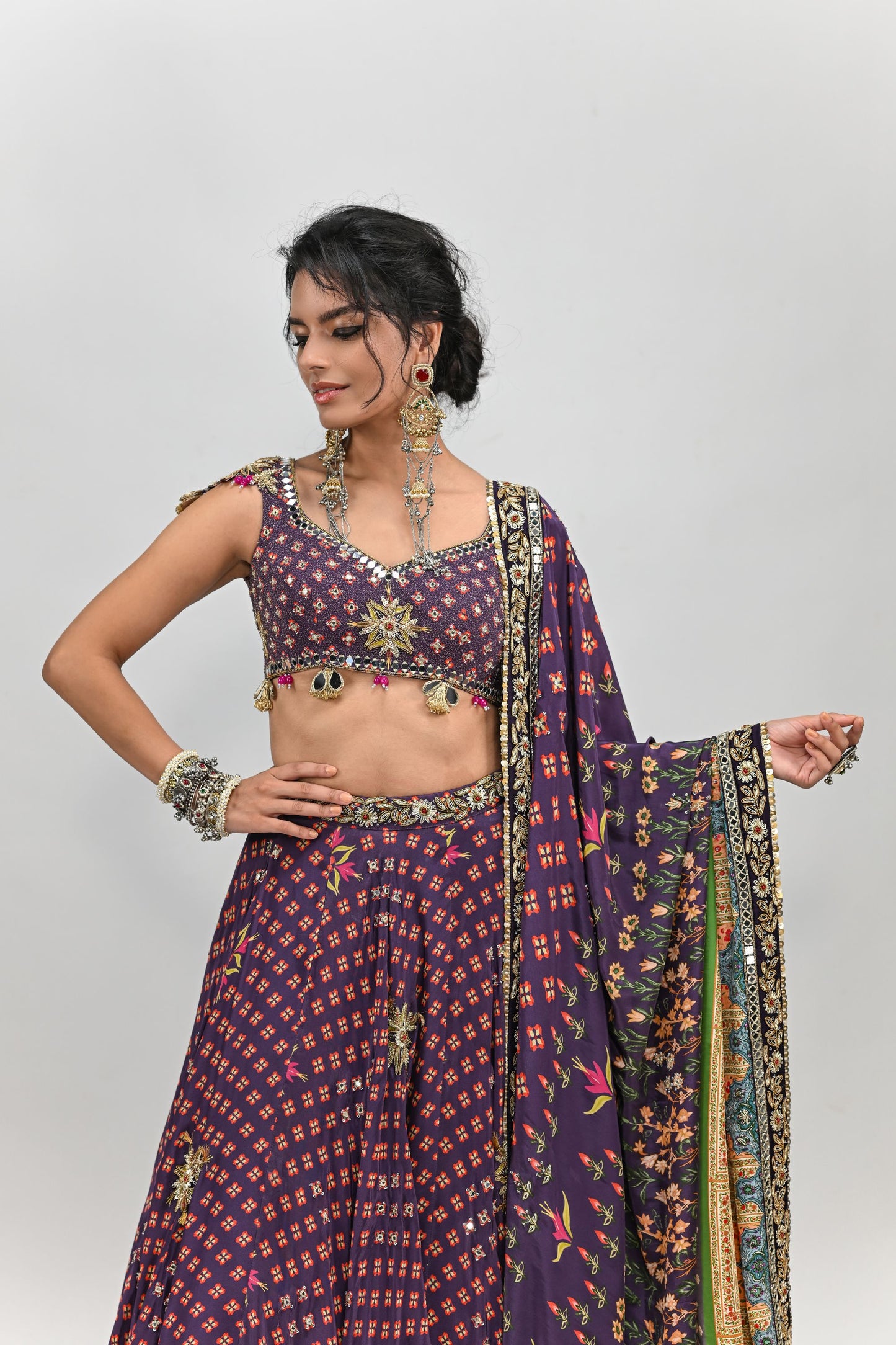 PLUM HIGHLIGHTED LEHENGA PAIRED WITH PLUM BADLA BLOUSE AND HIGHLIGHTED DUPATTA