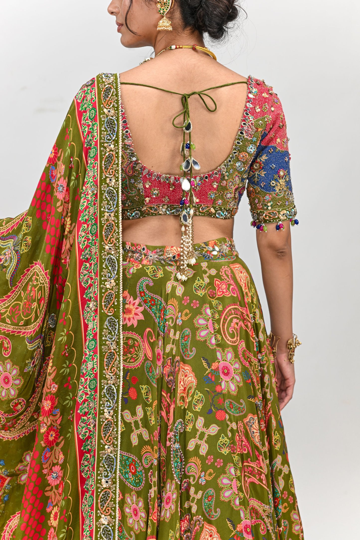 OLIVE HIGHLIGHTED LEHENGA PAIRED WITH PATCH EMBROIDERED BADLA BLOUSE AND DUAL PRINT HIGHLIGHTED DUPATTA