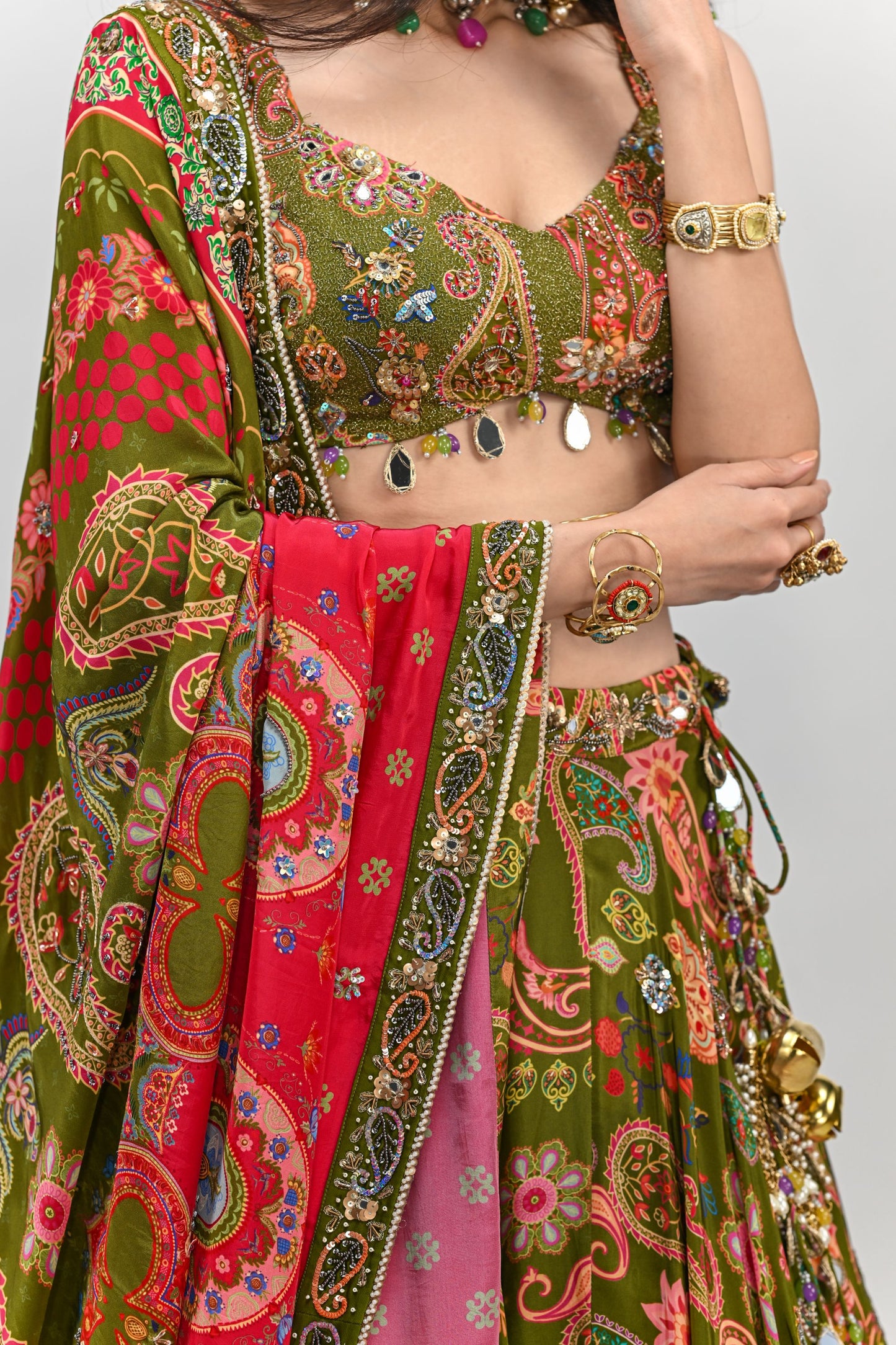 OLIVE HIGHLIGHTED LEHENGA PAIRED WITH BADLA EMBROIDERED OLIVE BLOUSE AND DUAL PRINT HIGHLIGHTED DUPATTA