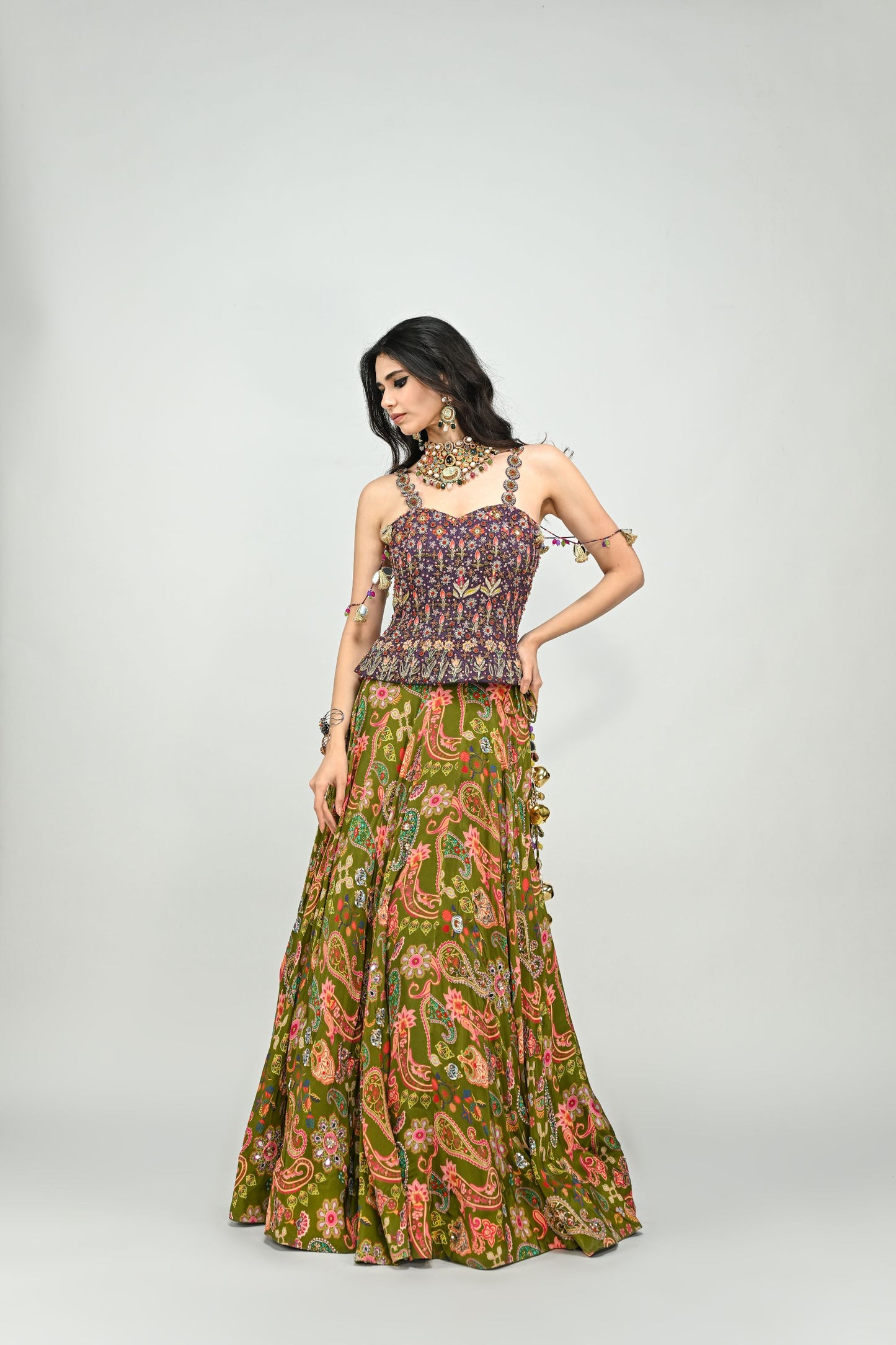 OLIVE HIGHLIGHTED LEHENGA PAIRED WITH PLUM EMBROIDERED BADLA CORSET
