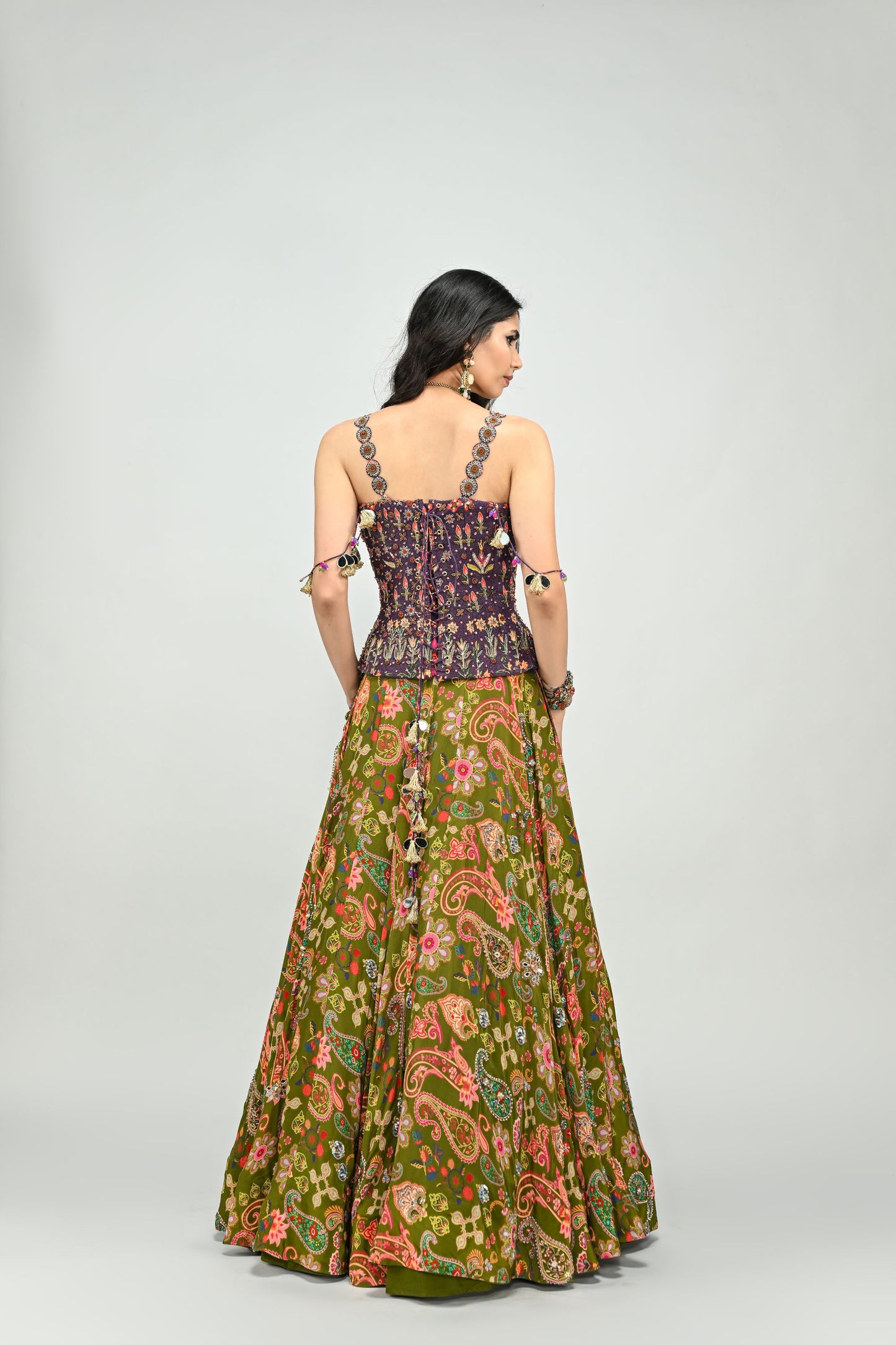 OLIVE HIGHLIGHTED LEHENGA PAIRED WITH PLUM EMBROIDERED BADLA CORSET