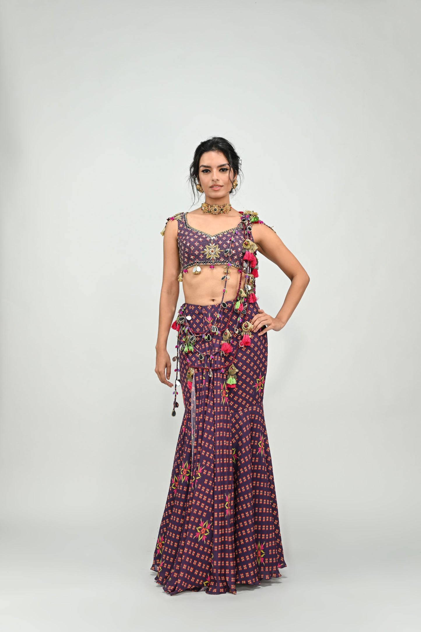 PLUM PRESTITCHED TASSEL SAREE PAIRED WITH BADLA EMBROIDERED PLUM BADLA HIGHLIGHTED BLOUSE
