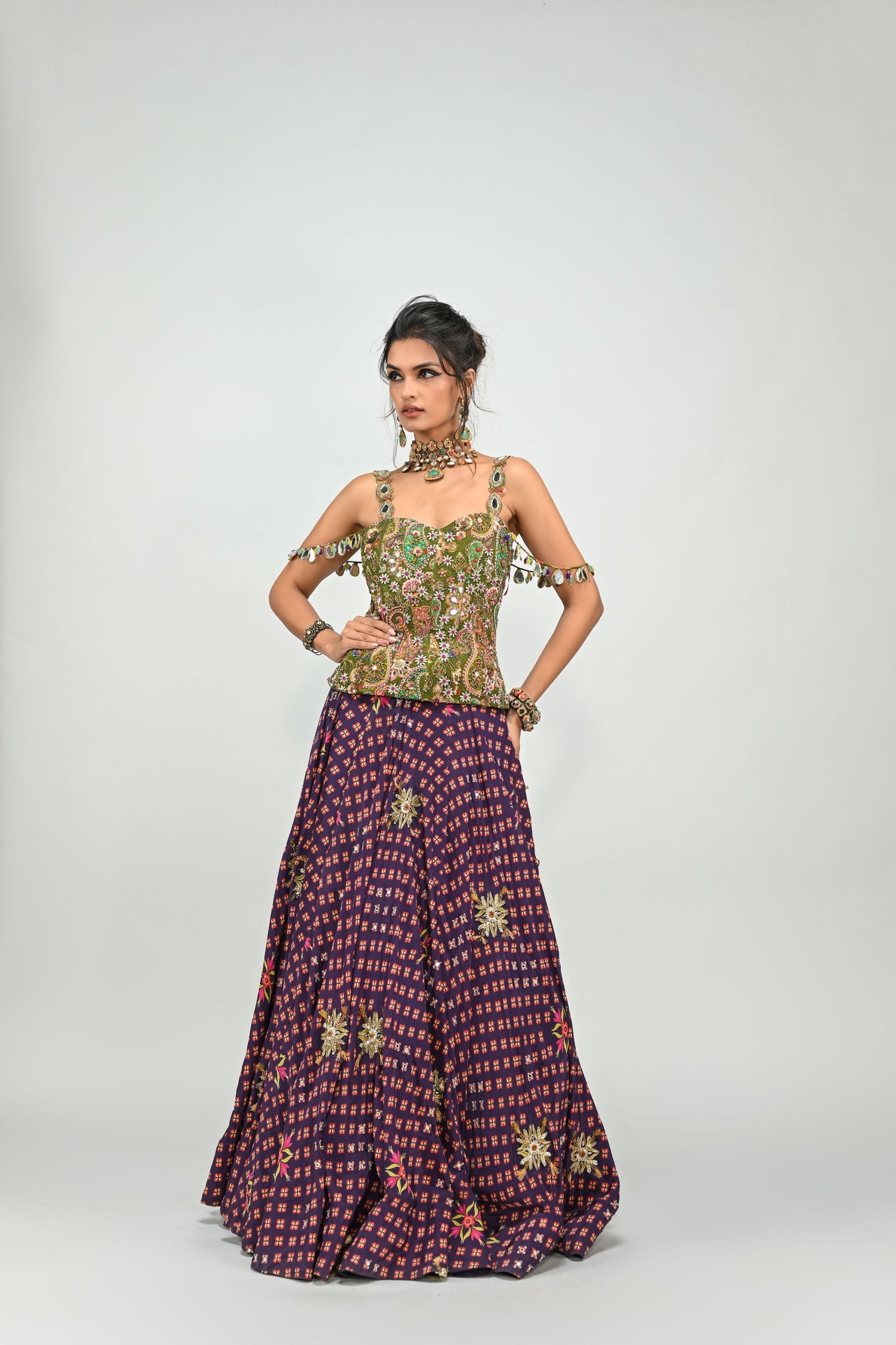 PLUM HIGHLIGHTED LEHENGA PAIRED WITH PLUM BADLA CORSET