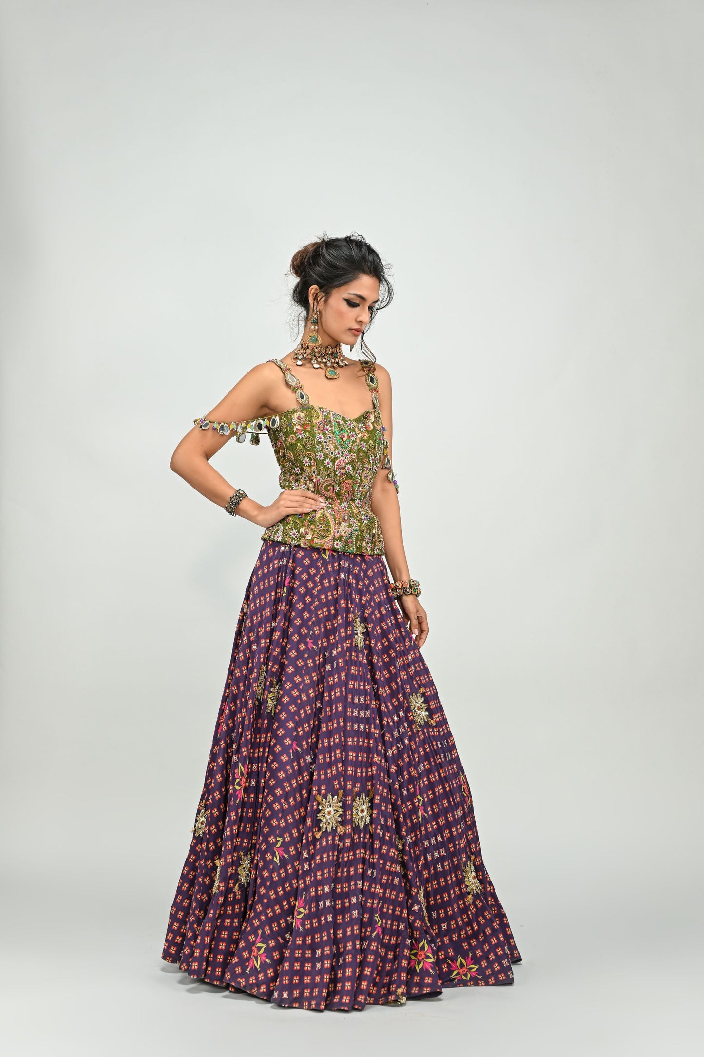PLUM HIGHLIGHTED LEHENGA PAIRED WITH PLUM BADLA CORSET