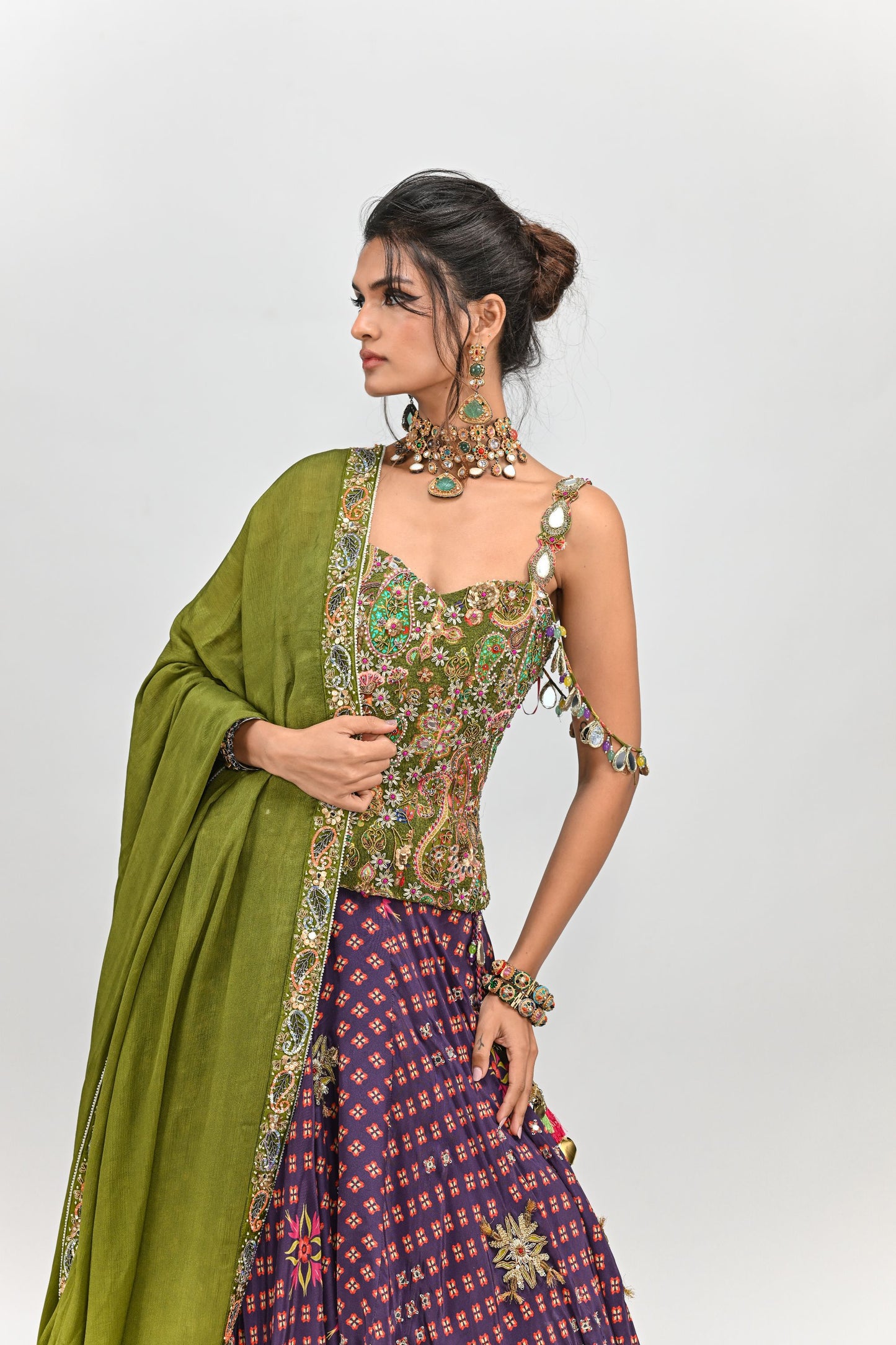 PLUM HIGHLIGHTED LEHENGA PAIRED WITH PLUM BADLA CORSET AND DUPATTA