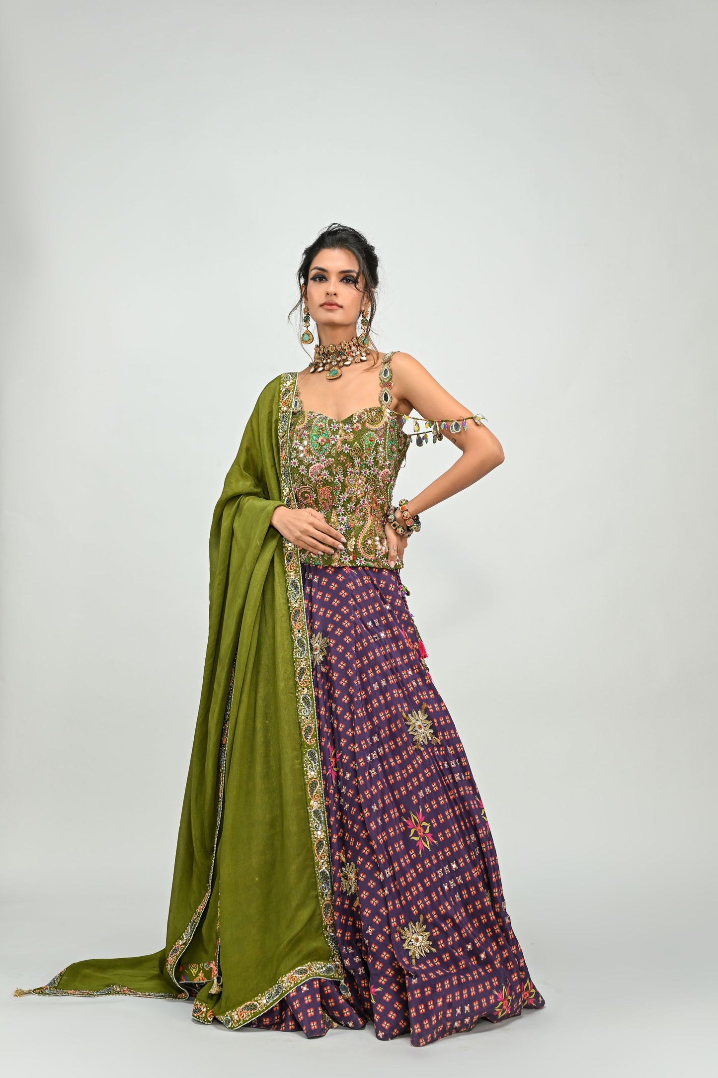 PLUM HIGHLIGHTED LEHENGA PAIRED WITH PLUM BADLA CORSET AND DUPATTA