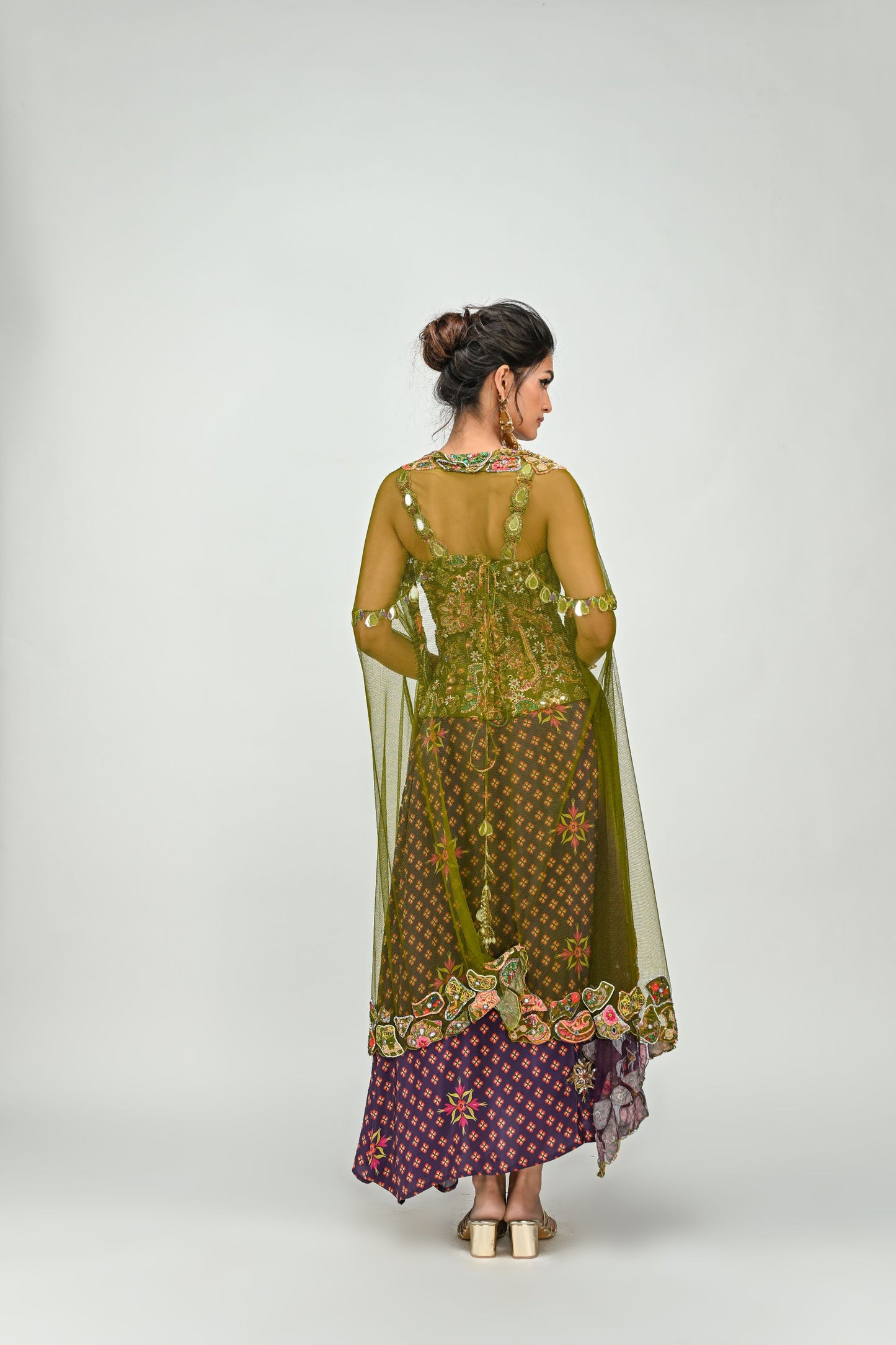 OLIVE BADLA EMBROIDERED CORSET PAIRED WITH EMBROIDERED PLUM DHOTI SET AND OMBRE APPLIQUE CAPE