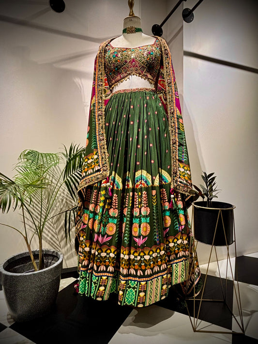 Rang green lehenga paired with rani dupatta