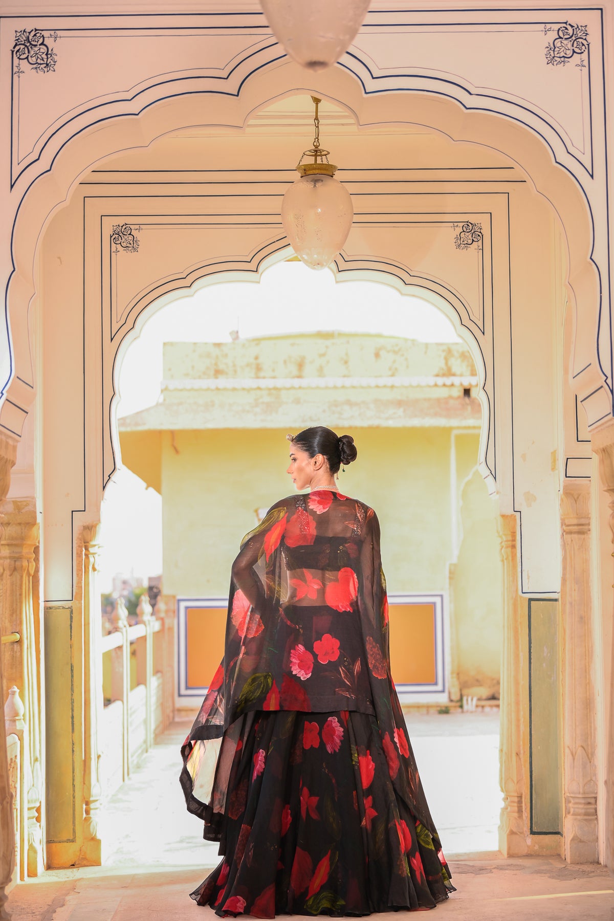 PRINTED LEHENGA PAIRED WITH EMB BRALATTE AND CAPE