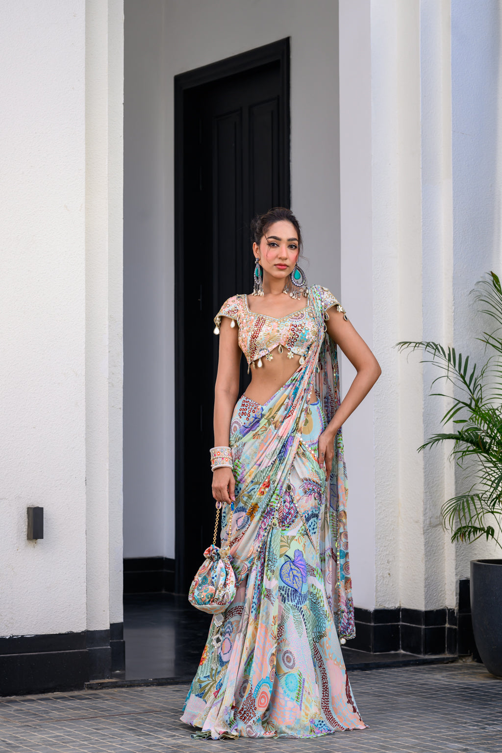 GARDENIA HIGHLIGHTED SAREE PAIRED WITH HAND WORK MIRROR BLOUSE