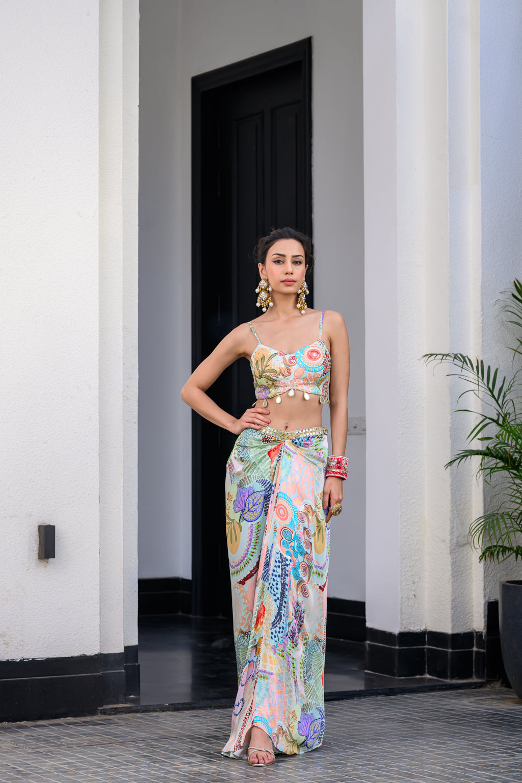 GARDENIA DHOTI SKIRT SET PAIRED WITH HIGHLITED BRALLETEE WITH HIGHLIGHTED APLLIQUE CAPE