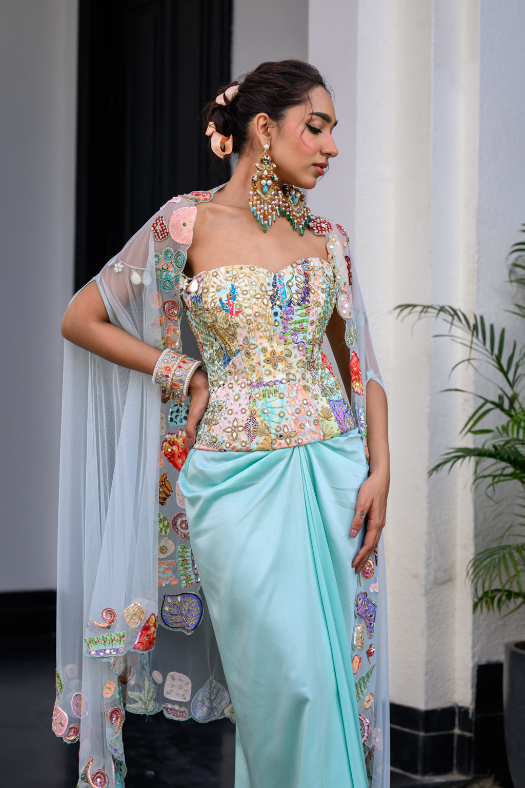 GARDENIA HIGHLIGHTED CORSET WITH DHOTI SKIRT AND CAPE