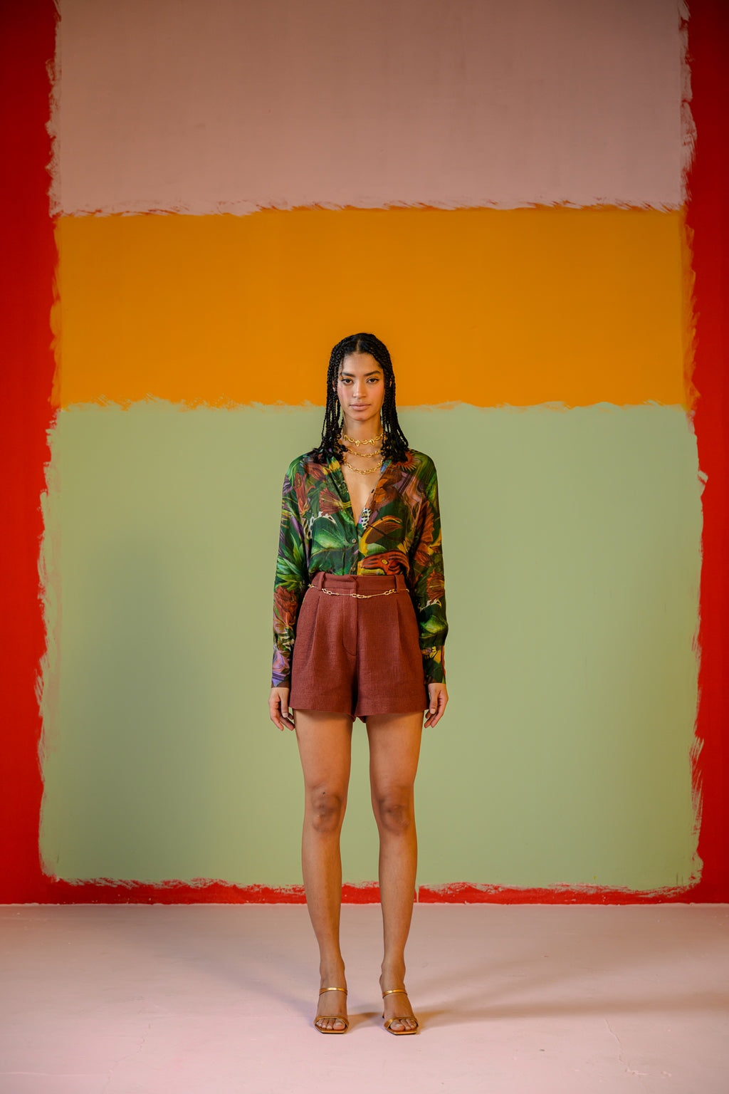 Green Shirt Paired With Camel Shorts