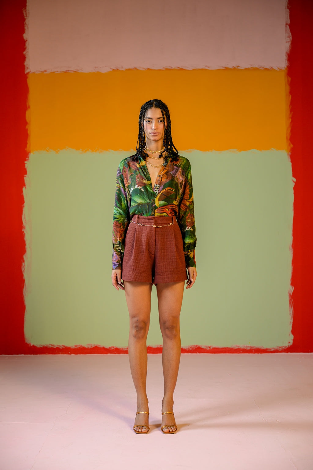 Green Shirt Paired With Camel Shorts
