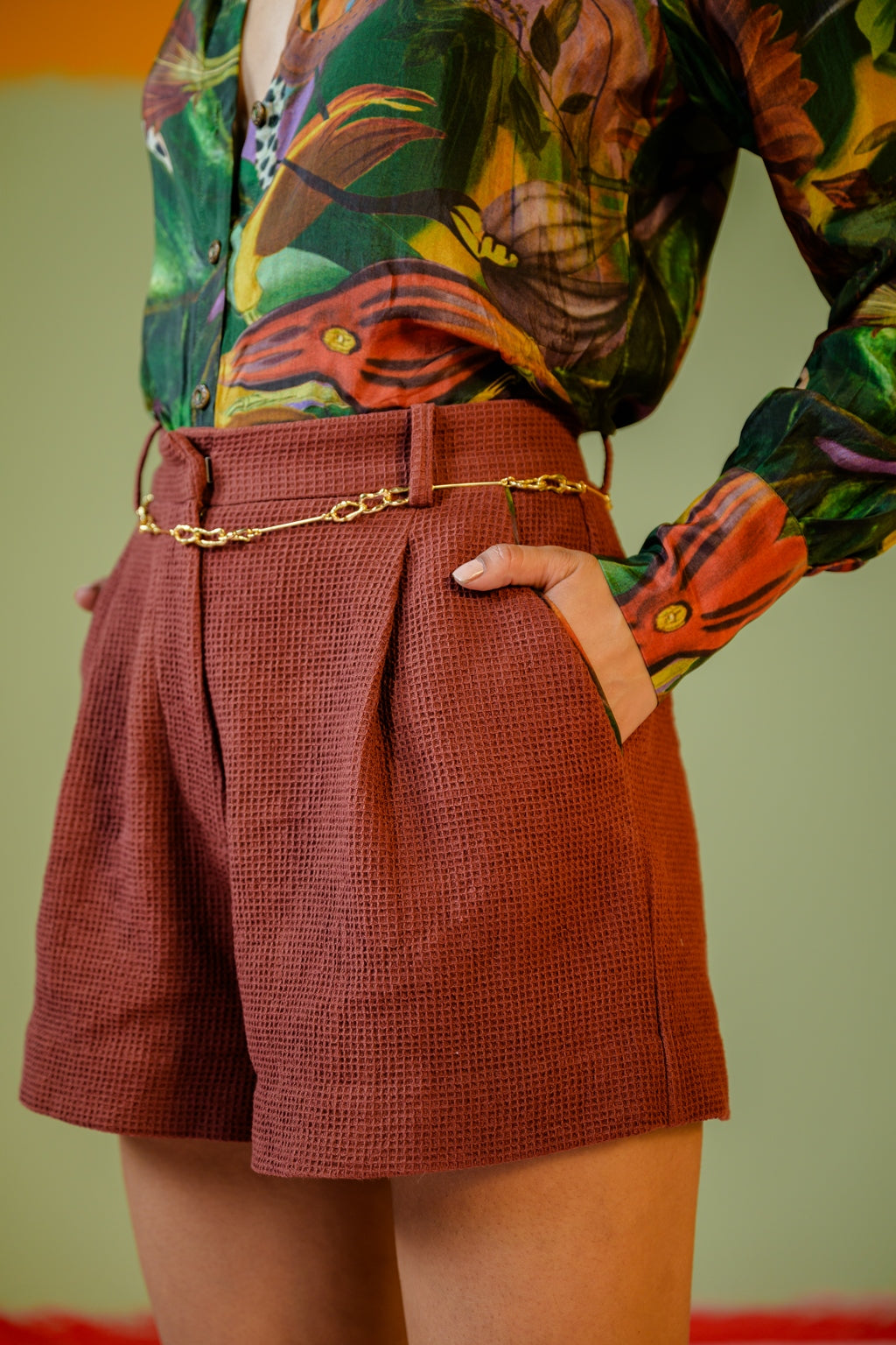 Green Shirt Paired With Camel Shorts