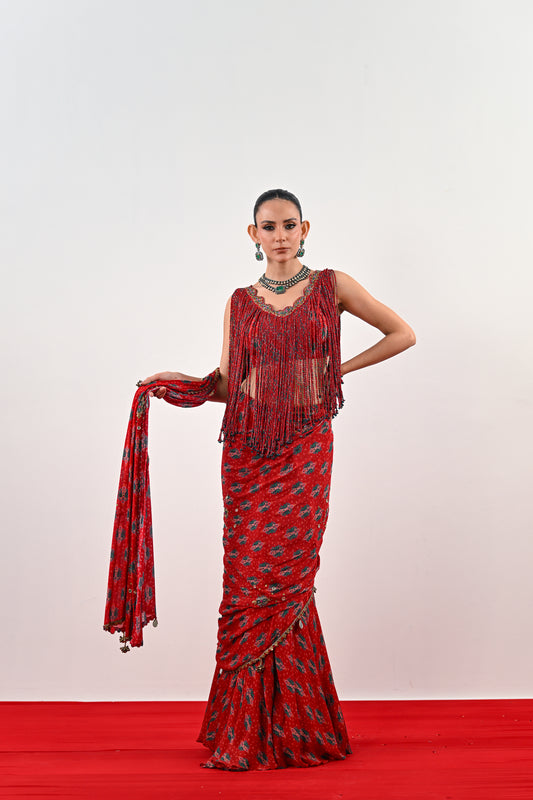S PRE STITCHED SAREE PAIRED WITH TASSLE BLOUSE