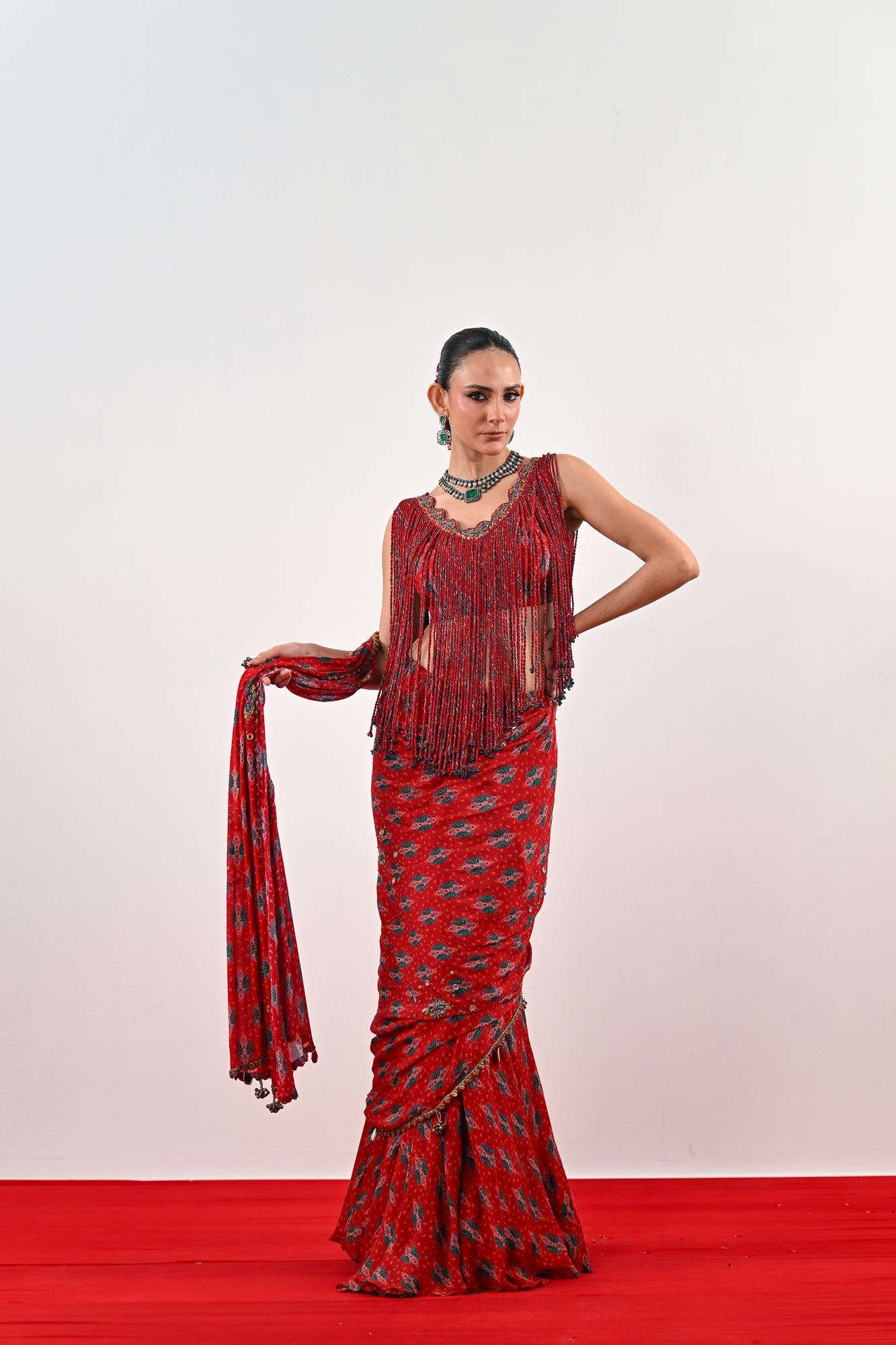 S PRE STITCHED SAREE PAIRED WITH TASSLE BLOUSE