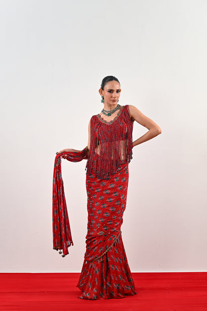 S PRE STITCHED SAREE PAIRED WITH TASSLE BLOUSE