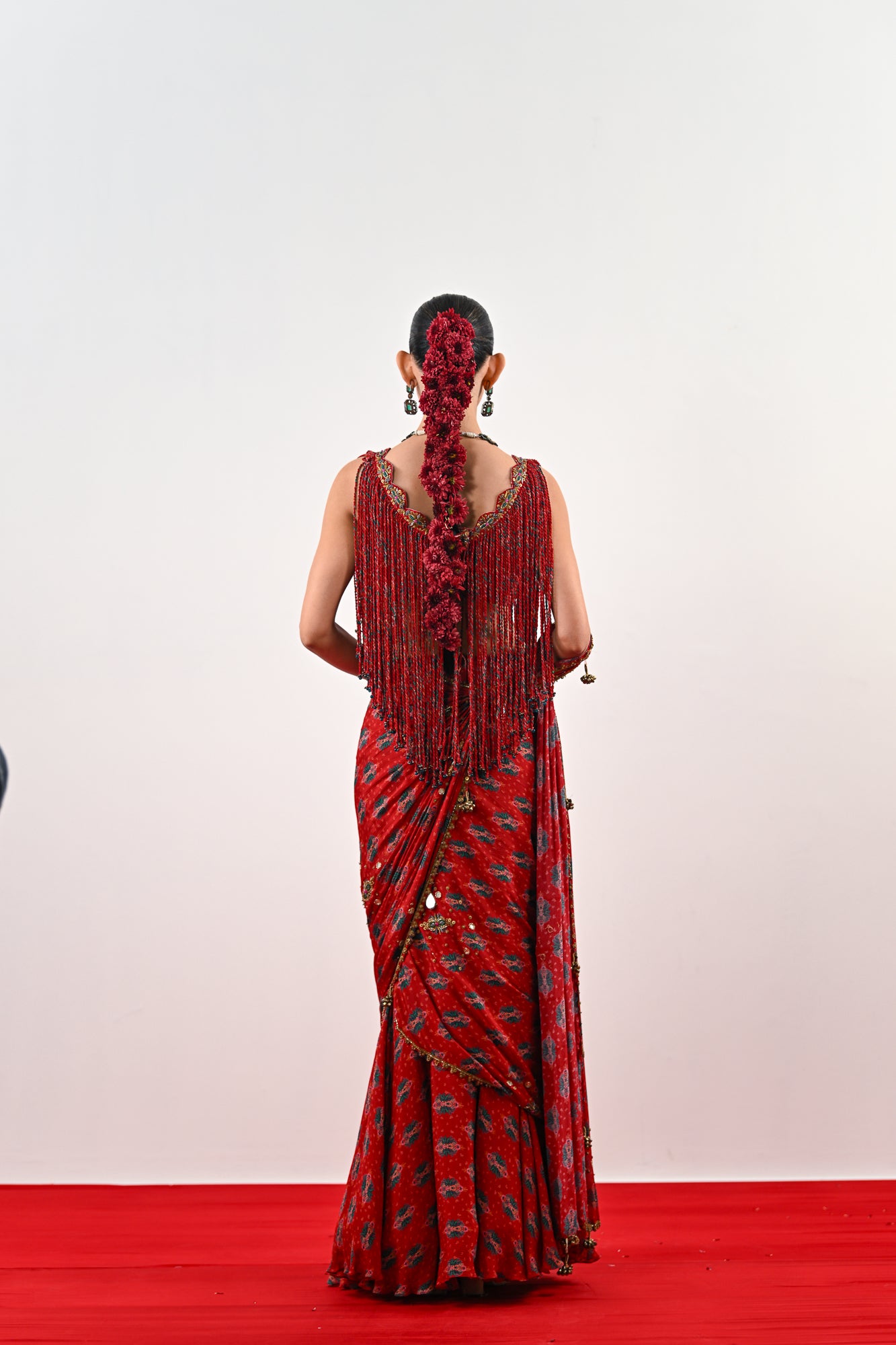 S PRE STITCHED SAREE PAIRED WITH TASSLE BLOUSE