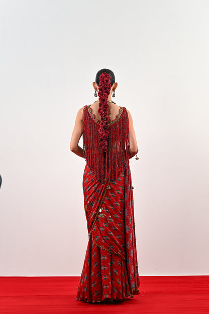 S PRE STITCHED SAREE PAIRED WITH TASSLE BLOUSE