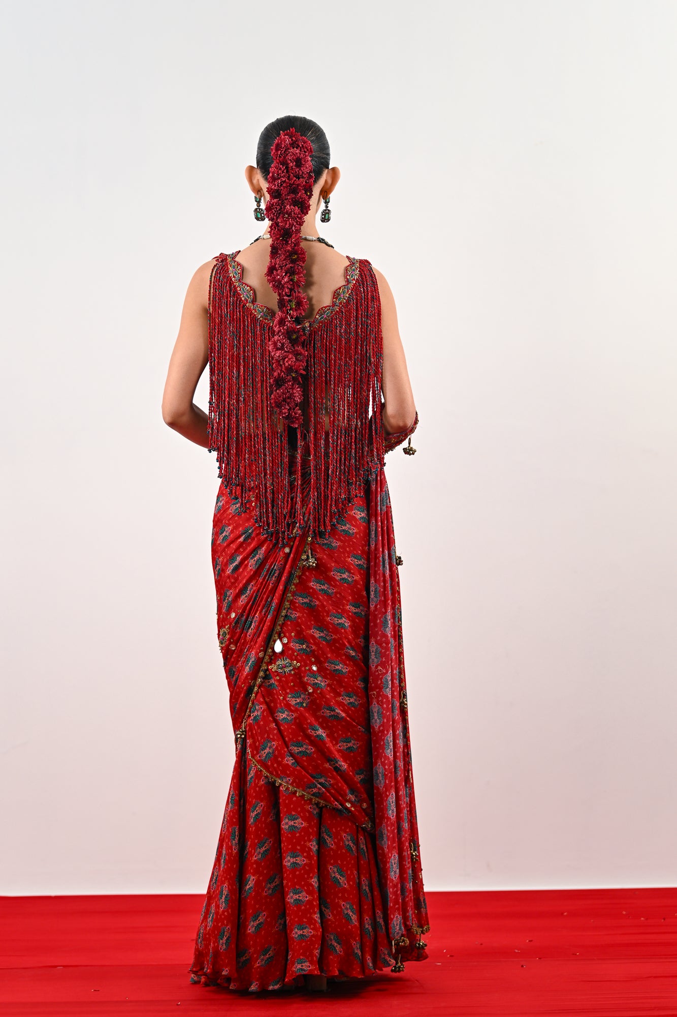 S PRE STITCHED SAREE PAIRED WITH TASSLE BLOUSE