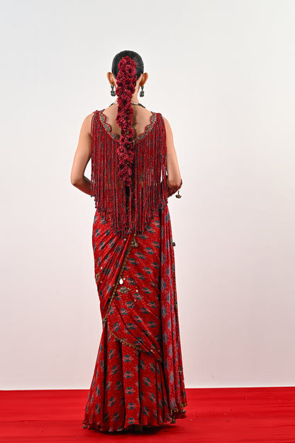 S PRE STITCHED SAREE PAIRED WITH TASSLE BLOUSE