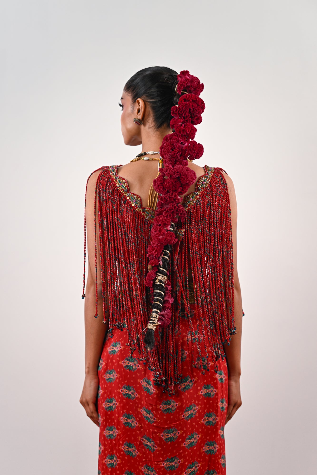 S TASSLE TOP PAIRED WITH PRINTED DHOTI SET