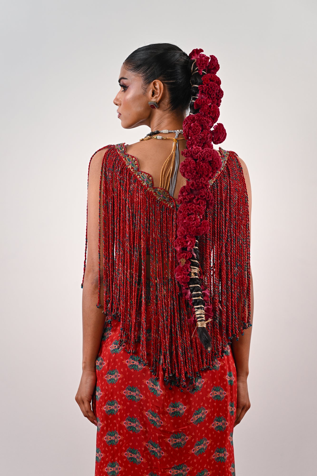 S TASSLE TOP PAIRED WITH PRINTED DHOTI SET