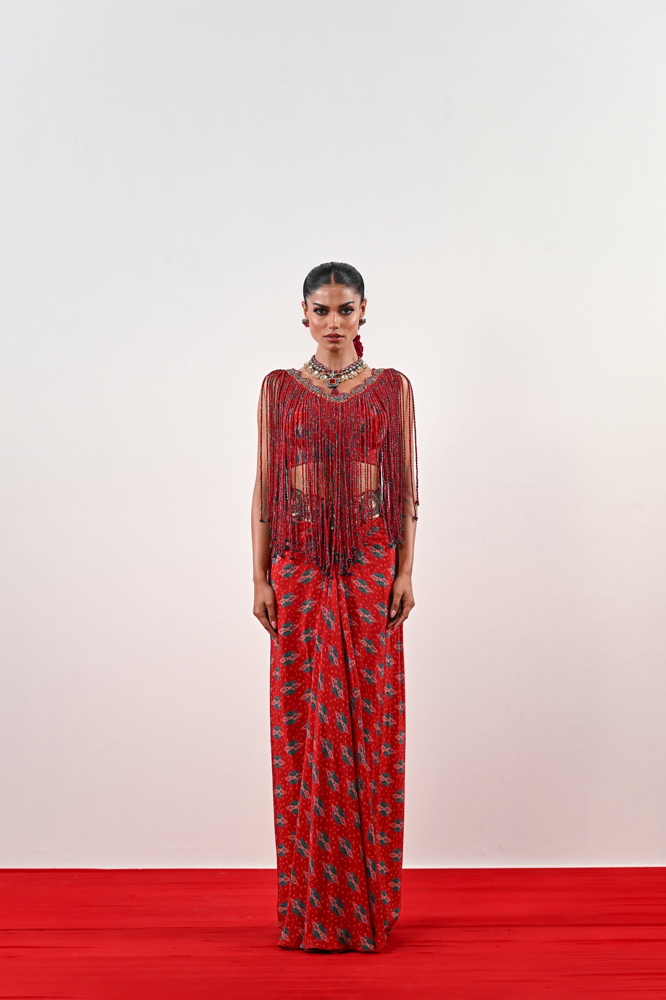 S TASSLE TOP PAIRED WITH PRINTED DHOTI SET