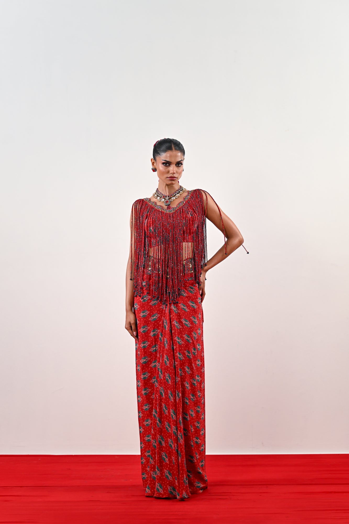 S TASSLE TOP PAIRED WITH PRINTED DHOTI SET