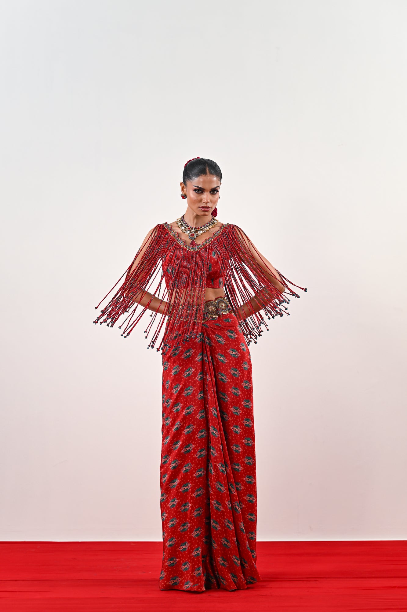 S TASSLE TOP PAIRED WITH PRINTED DHOTI SET