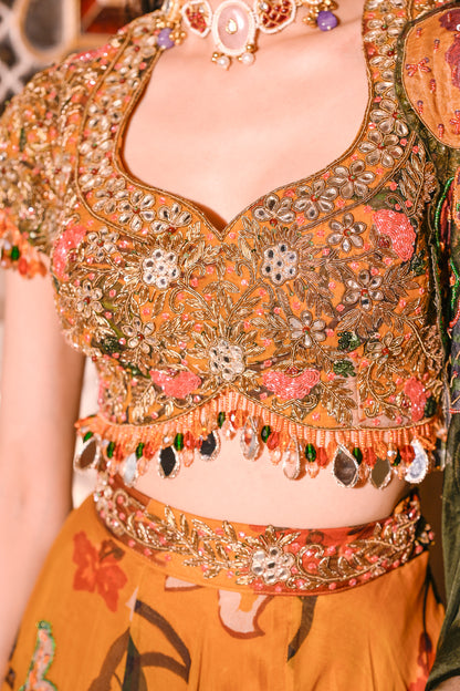 EMB BLOUSE PAIRED WITH HIGHLIGHTED LEHENGA WITH APPLIQUE DUEL CAPE