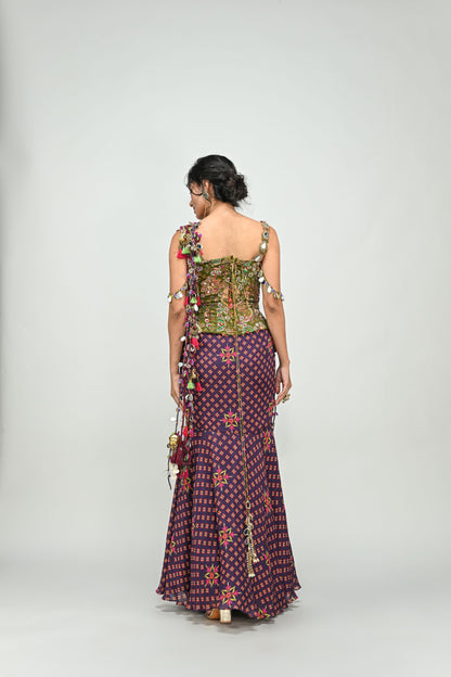 PLUM PRESTITCHED TASSEL SAREE PAIRED WITH BADLA EMBROIDERED GREEN CORSET