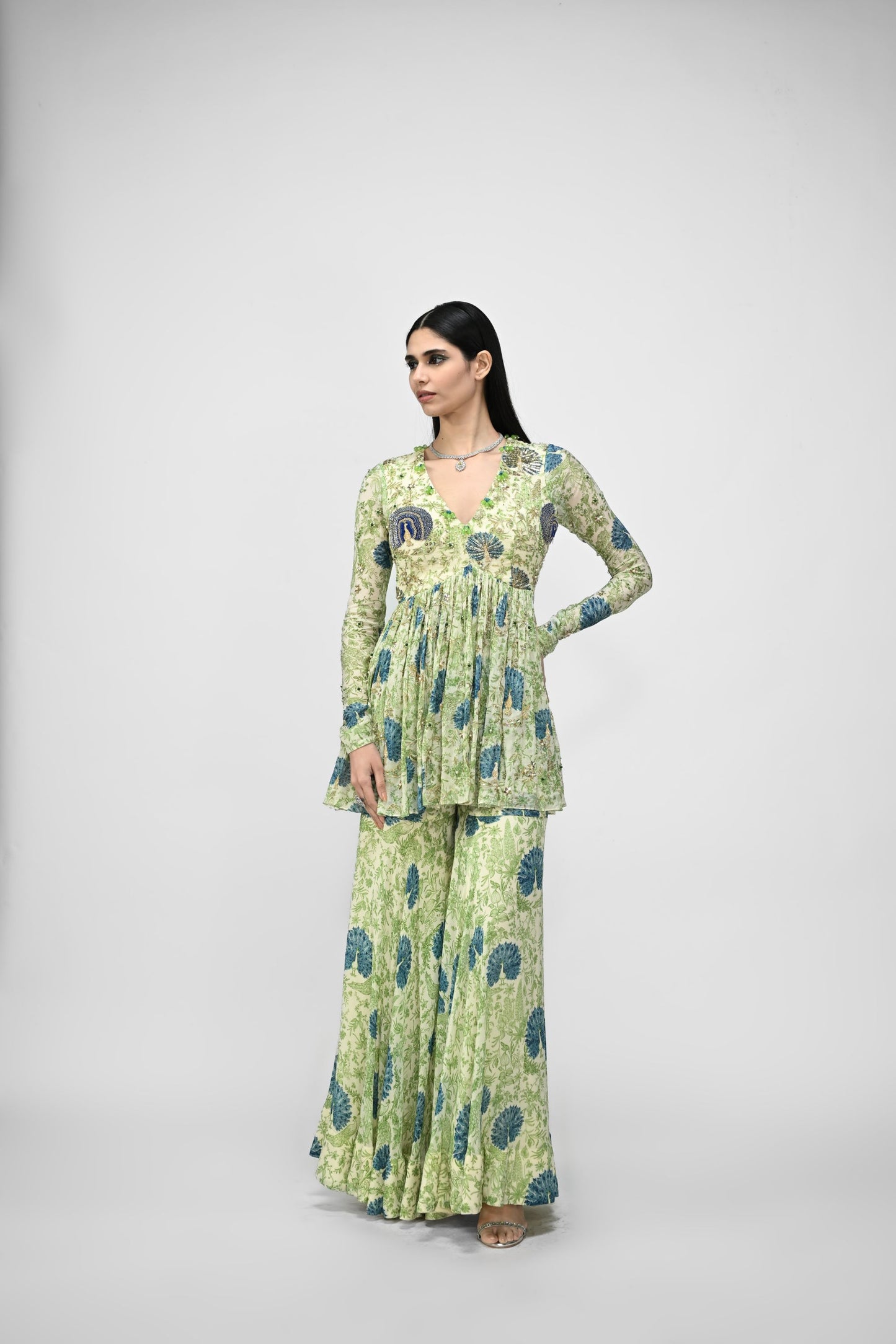 Peacock Highlited Peplum Kurta Paired With Peacock Sharara Pants