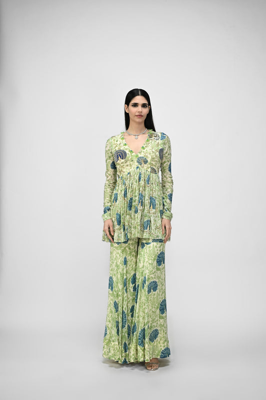 Peacock Highlited Peplum Kurta Paired With Peacock Sharara Pants