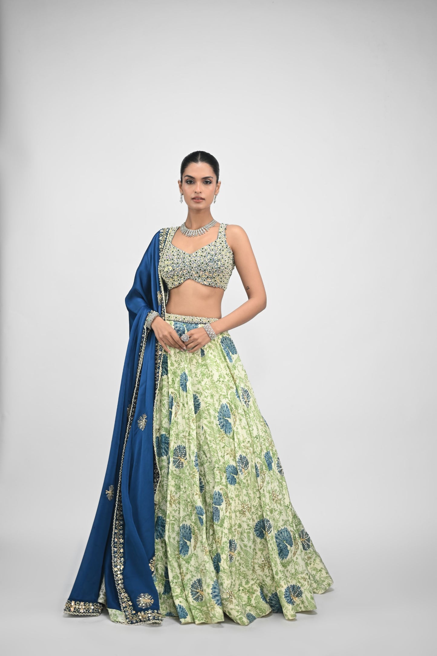 Peacock Highlighted Lehenga Paired With Pearl Blouse And Embroidered Dupatta