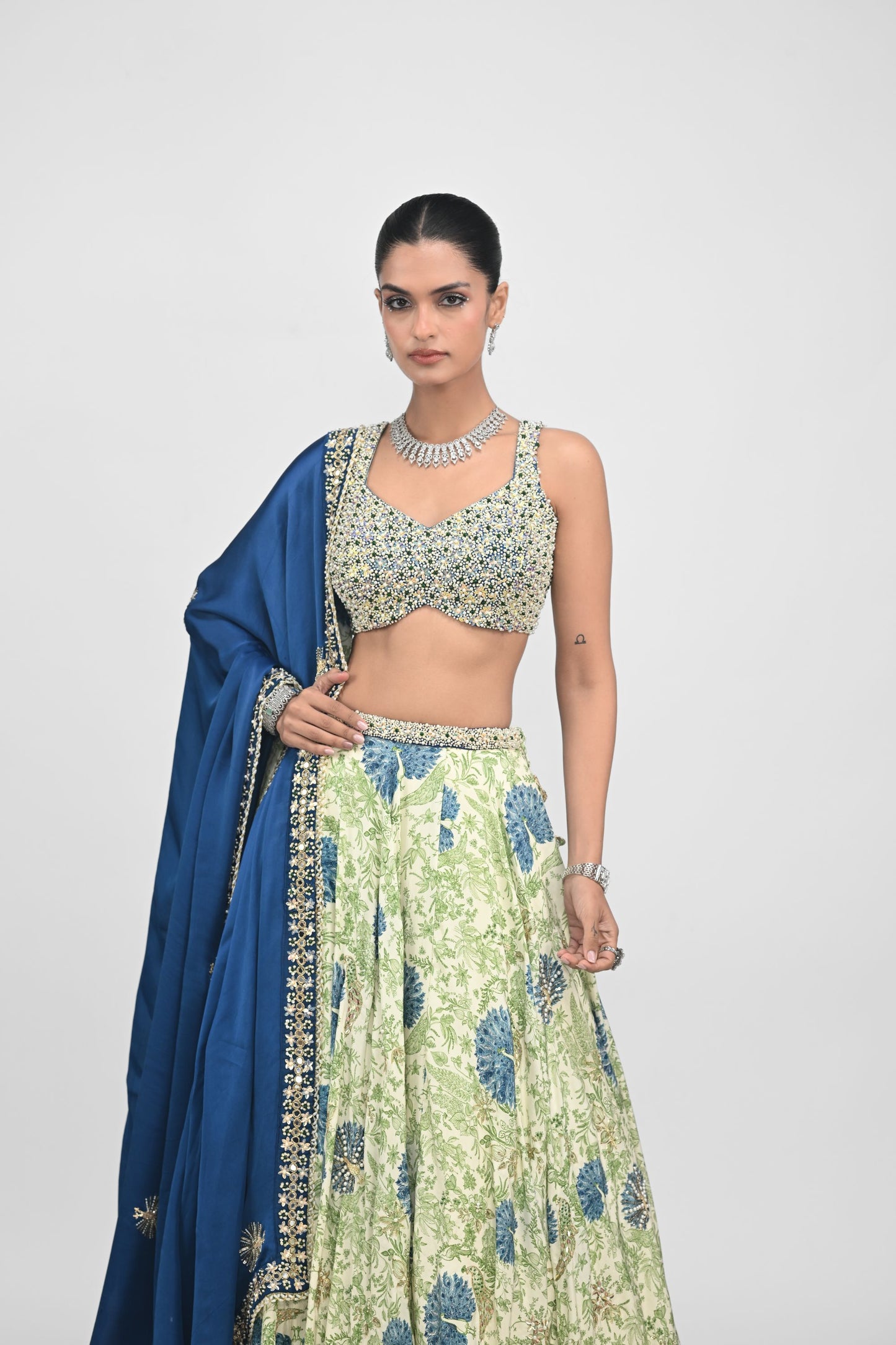 Peacock Highlighted Lehenga Paired With Pearl Blouse And Embroidered Dupatta