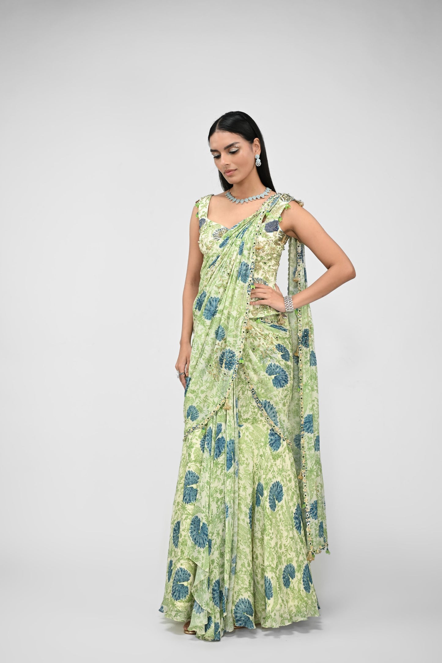 Peacock Highlighted Pre Stitched Saree Paired With Highlighted Corset Blouse