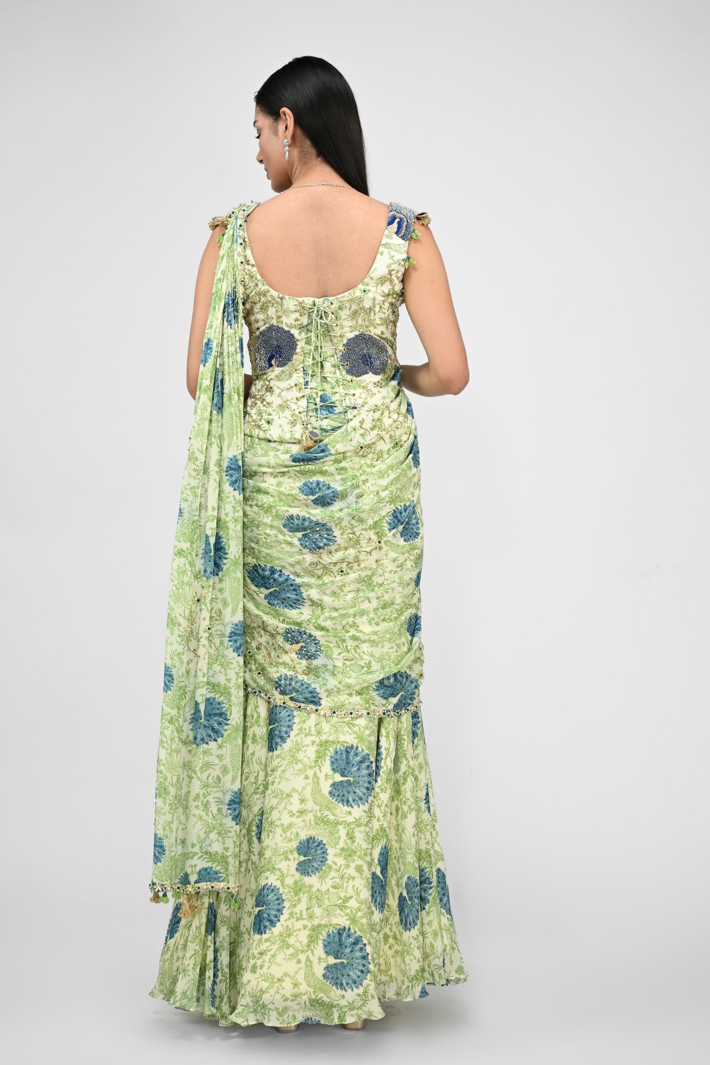 Peacock Highlighted Pre Stitched Saree Paired With Highlighted Corset Blouse