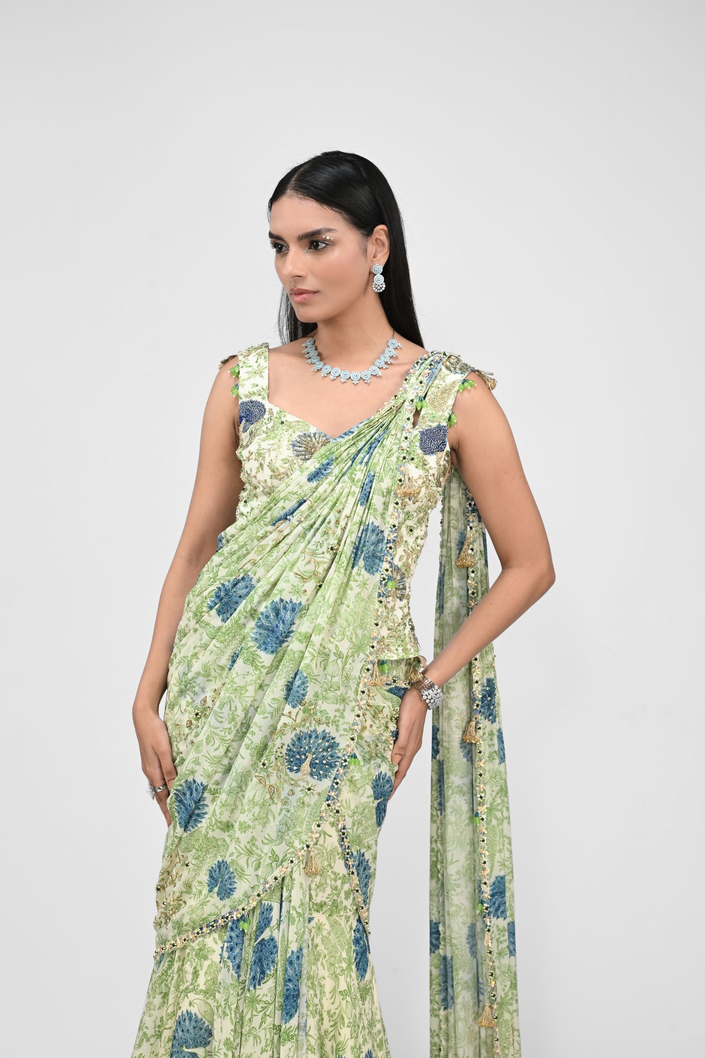 Peacock Highlighted Pre Stitched Saree Paired With Highlighted Corset Blouse